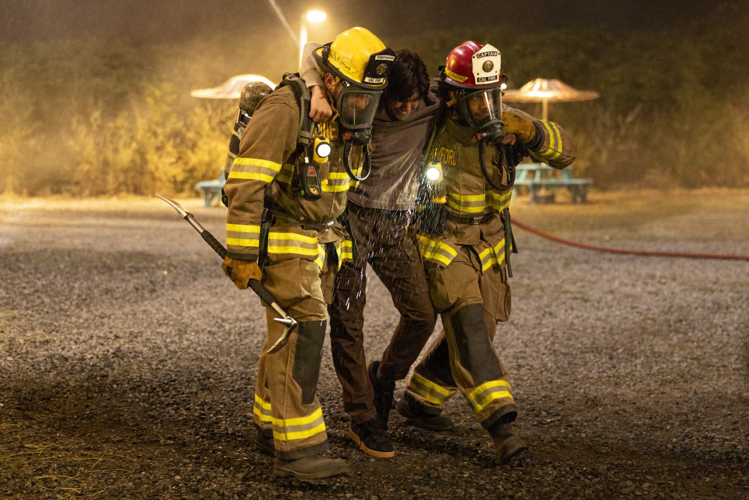 “Happy First Day, Manny” – The team responds to a dangerous fire at the local drive in movie theater where they must enlist civilians to help stop the spread, on FIRE COUNTRY, Friday, Nov. 14 (9:00-10:00 PM, ET/PT) on the CBS Television Network, and streaming on Paramount+ (live and on-demand for Paramount+ Premium plan subscribers, or on-demand for Paramount+ Essential subscribers the day after the episode airs).  Pictured (L-R): Max Thieriot as Bode Leone, Jaden Rain as Mac, and Jordan Calloway as Jake Crawford. Photo: Eike Schroter/CBS ©2025 CBS Broadcasting, Inc. All Rights Reserved.