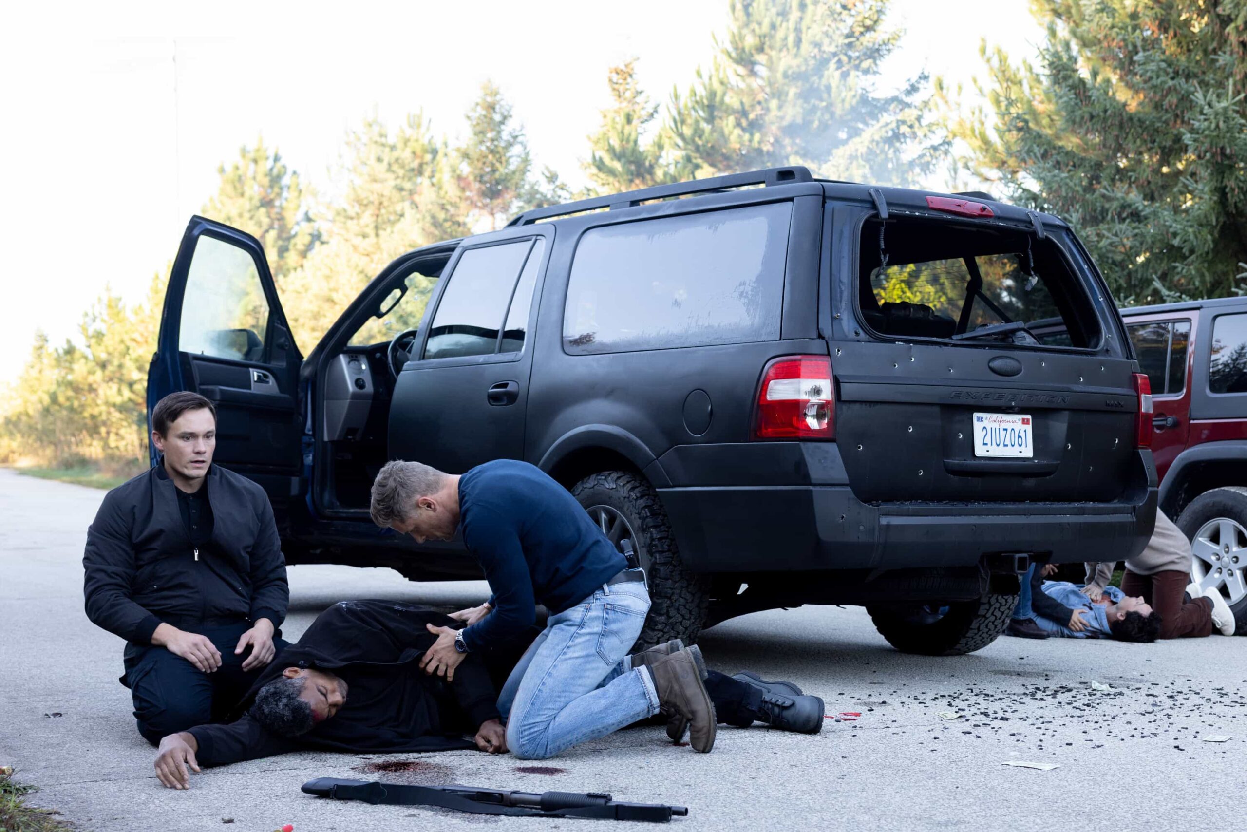 “Death & Taxes” – As cannabis growers in Edgewater scramble to pay their taxes in cash, a violent robbery leaves a man in critical condition and exposes the vulnerability of the legal cannabis trade. Meanwhile, Mickey navigates a tense meal with her stepsister, Sharon (FIRE COUNTRY), on SHERIFF COUNTRY, Friday, Dec. 12 (8:00-9:00 PM, ET/PT) on the CBS Television Network, and streaming on Paramount+ (live and on-demand for Paramount+ Premium plan subscribers, or on-demand for Paramount+ Essential subscribers the day after the episode airs)*. Pictured: Tom Stevens as Cole, Dennis Lafond as Marcus and Matt Lauria as Boone. Photo: Darren Goldstein/CBS ©2025 CBS Broadcasting, Inc. All Rights Reserved.