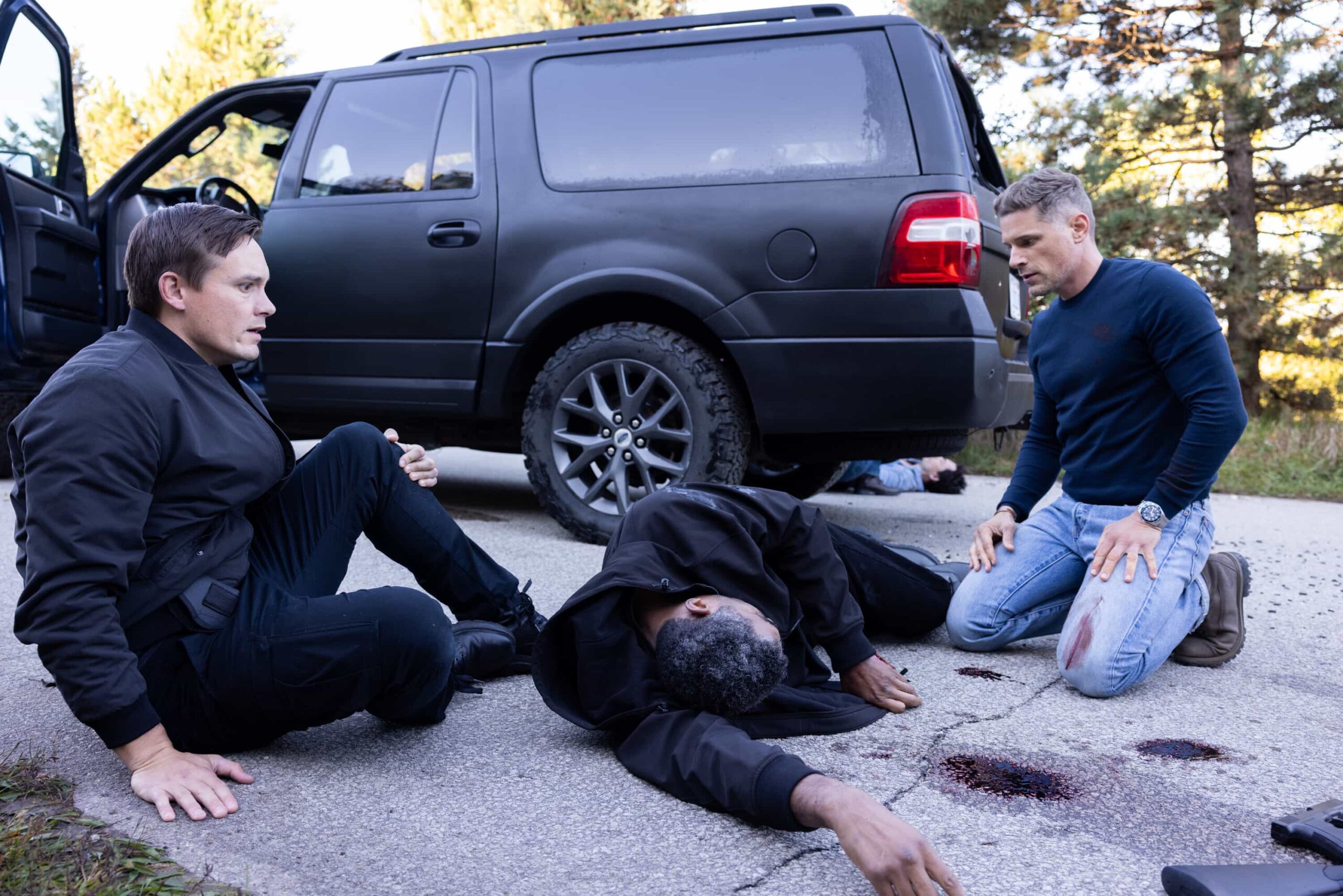 “Death & Taxes” – As cannabis growers in Edgewater scramble to pay their taxes in cash, a violent robbery leaves a man in critical condition and exposes the vulnerability of the legal cannabis trade. Meanwhile, Mickey navigates a tense meal with her stepsister, Sharon (FIRE COUNTRY), on SHERIFF COUNTRY, Friday, Dec. 12 (8:00-9:00 PM, ET/PT) on the CBS Television Network, and streaming on Paramount+ (live and on-demand for Paramount+ Premium plan subscribers, or on-demand for Paramount+ Essential subscribers the day after the episode airs)*. Pictured: Tom Stevens as Cole, Dennis Lafond as Marcus and Matt Lauria as Boone. Photo: Darren Goldstein/CBS ©2025 CBS Broadcasting, Inc. All Rights Reserved.