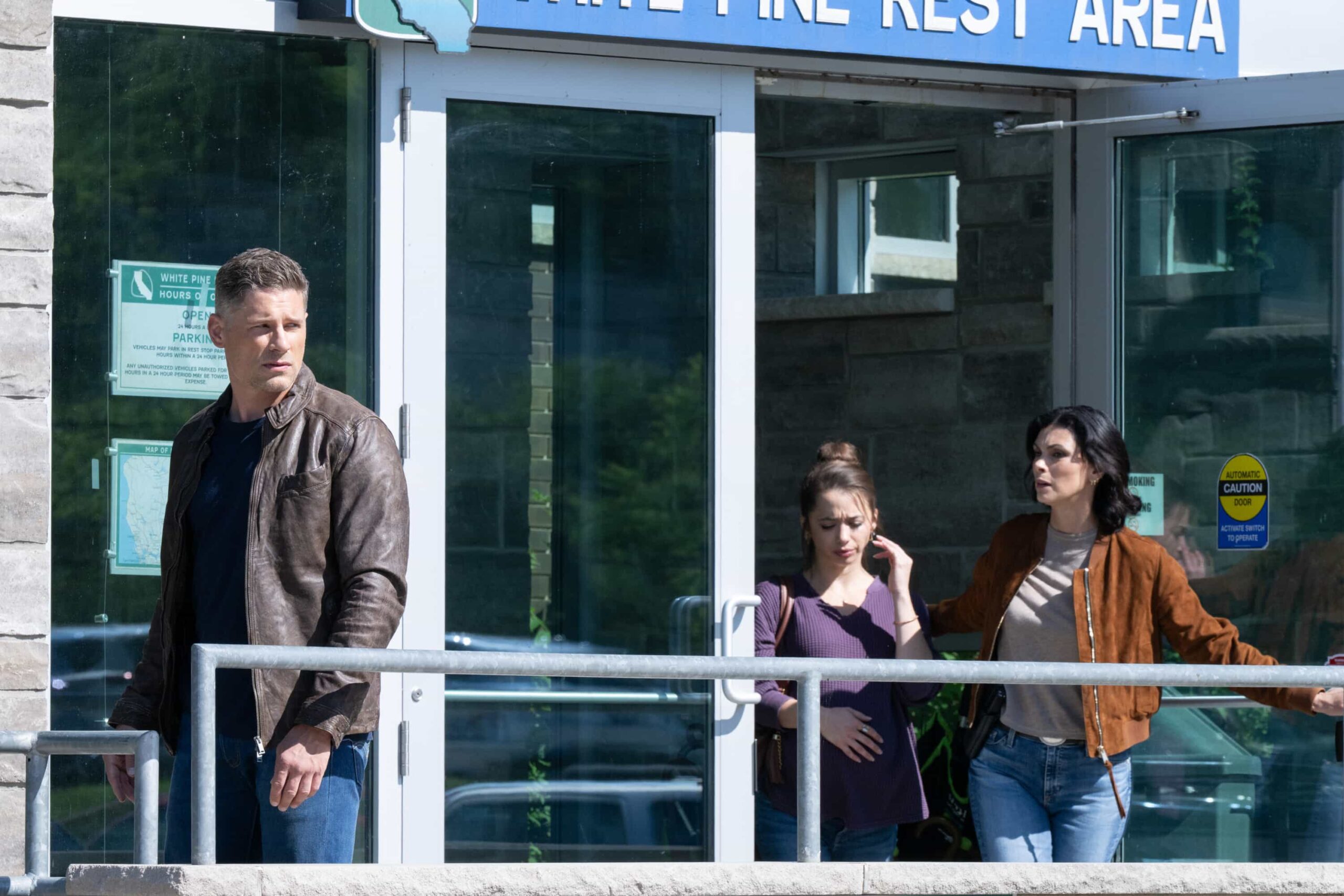 “Expecting Trouble” – A high-stakes transport mission puts Sheriff Mickey Fox and Deputy Boone on edge as they race against time to protect a vulnerable witness, on SHERIFF COUNTRY, Friday, Nov. 14 (8:00-9:00 PM, ET/PT) on the CBS Television Network, and streaming on Paramount+ (live and on-demand for Paramount+ Premium plan subscribers, or on-demand for Paramount+ Essential subscribers the day after the episode airs)*.  Pictured: Matt Lauria as Boone, Emma Sofia as Val Fulton and Morena Baccarin as Sheriff Mickey Fox. Photo: Christos Kalohoridis/CBS ©2025 CBS Broadcasting, Inc. All Rights Reserved.