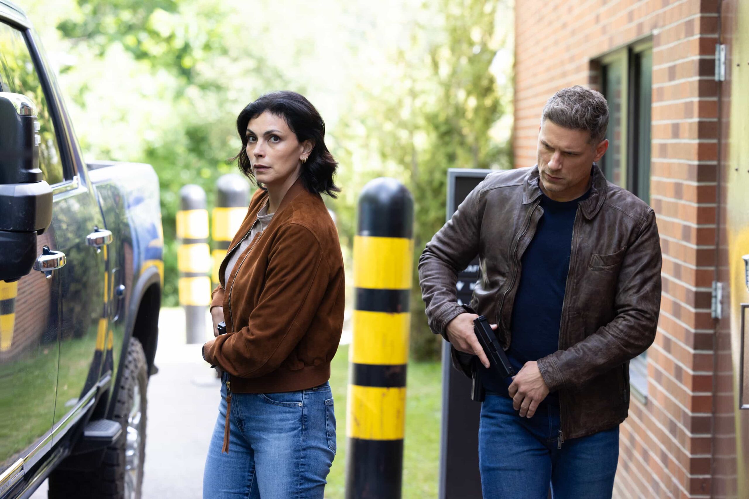 Sheriff Country Season 1 Episode 5 “Expecting Trouble” – A high-stakes transport mission puts Sheriff Mickey Fox and Deputy Boone on edge as they race against time to protect a vulnerable witness, on SHERIFF COUNTRY, Friday, Nov. 14 (8:00-9:00 PM, ET/PT) on the CBS Television Network, and streaming on Paramount+ (live and on-demand for Paramount+ Premium plan subscribers, or on-demand for Paramount+ Essential subscribers the day after the episode airs)*.  Pictured: Morena Baccarin as Sheriff Mickey Fox and Matt Lauria as Boone. Photo: Christos Kalohoridis/CBS ©2025 CBS Broadcasting, Inc. All Rights Reserved.