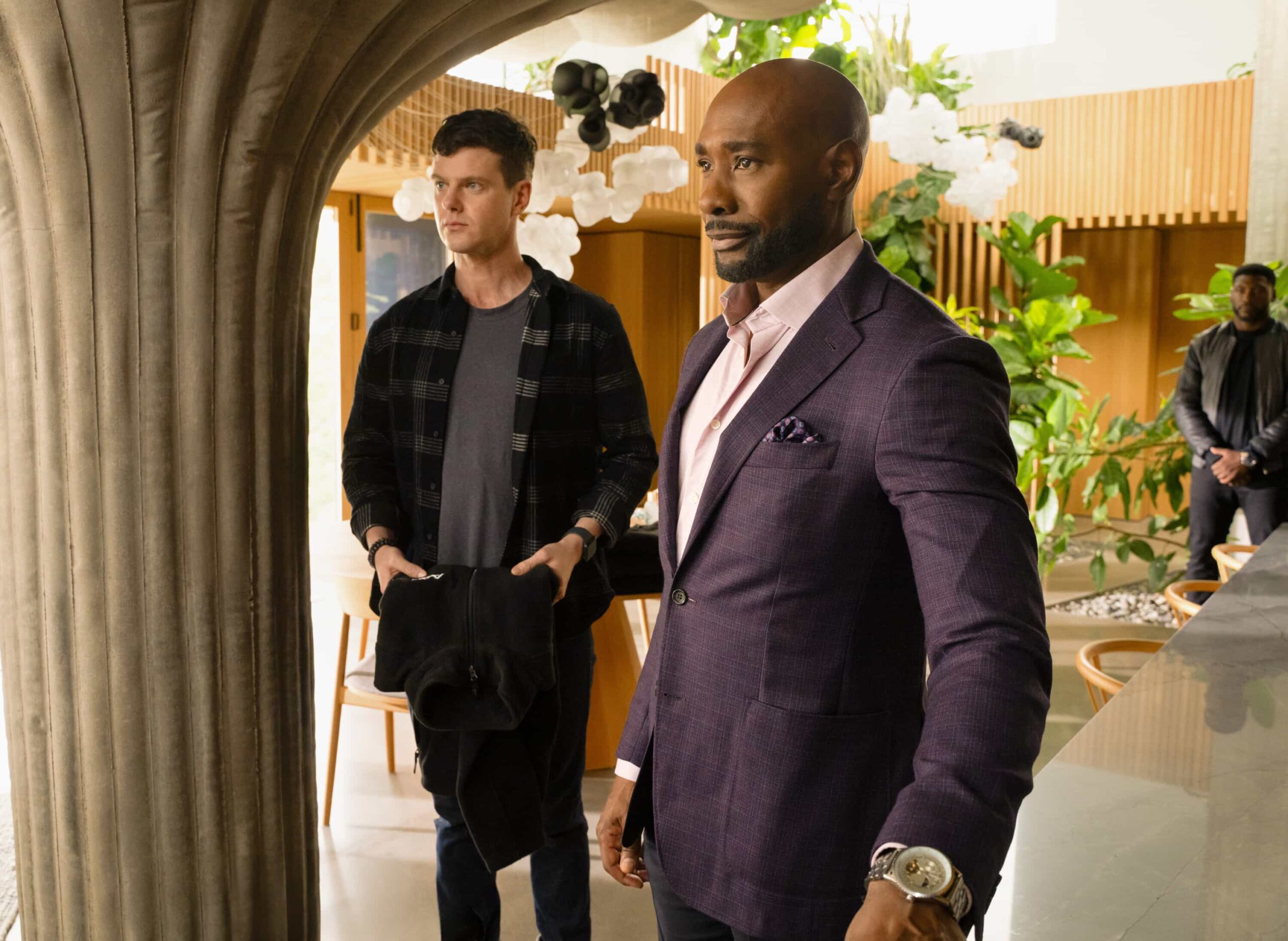 Watson Season 2 Episode 6 “Buying Time” - Watson and the fellows race against time to save the life of Xavier, a 21-year-old athlete with a fast-growing, seemingly incurable cancer. Meanwhile, Mycroft Holmes lets Watson know his team’s work at UHOP may no longer have funding available, on the CBS Original series WATSON, Monday, Nov. 17 (10:00-11:00 PM, ET/PT) on the CBS Television Network, and streaming on Paramount+* (live and on-demand for Paramount+ Premium plan subscribers, or on-demand for Paramount+ Essential subscribers the day after the episode airs). Pictured (L-R): Peter Mark Kendall as Dr. Adam Croft, Morris Chestnut as Dr. John Watson, and Jamall Johnson as Ranger Photo: Colin Bentley/CBS ©2025 CBS Broadcasting, Inc. All Rights Reserved.