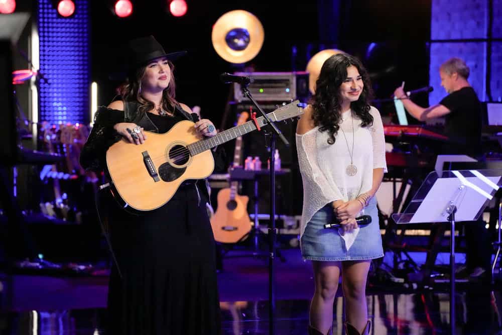 The Voice Season 28 Episode 13 -- "The Knockouts Part 4"  Episode 2813 -- Pictured: (l-r) Mindy Miller, Carolina Rodriguez -- (Photo by: Casey Durkin/NBC)