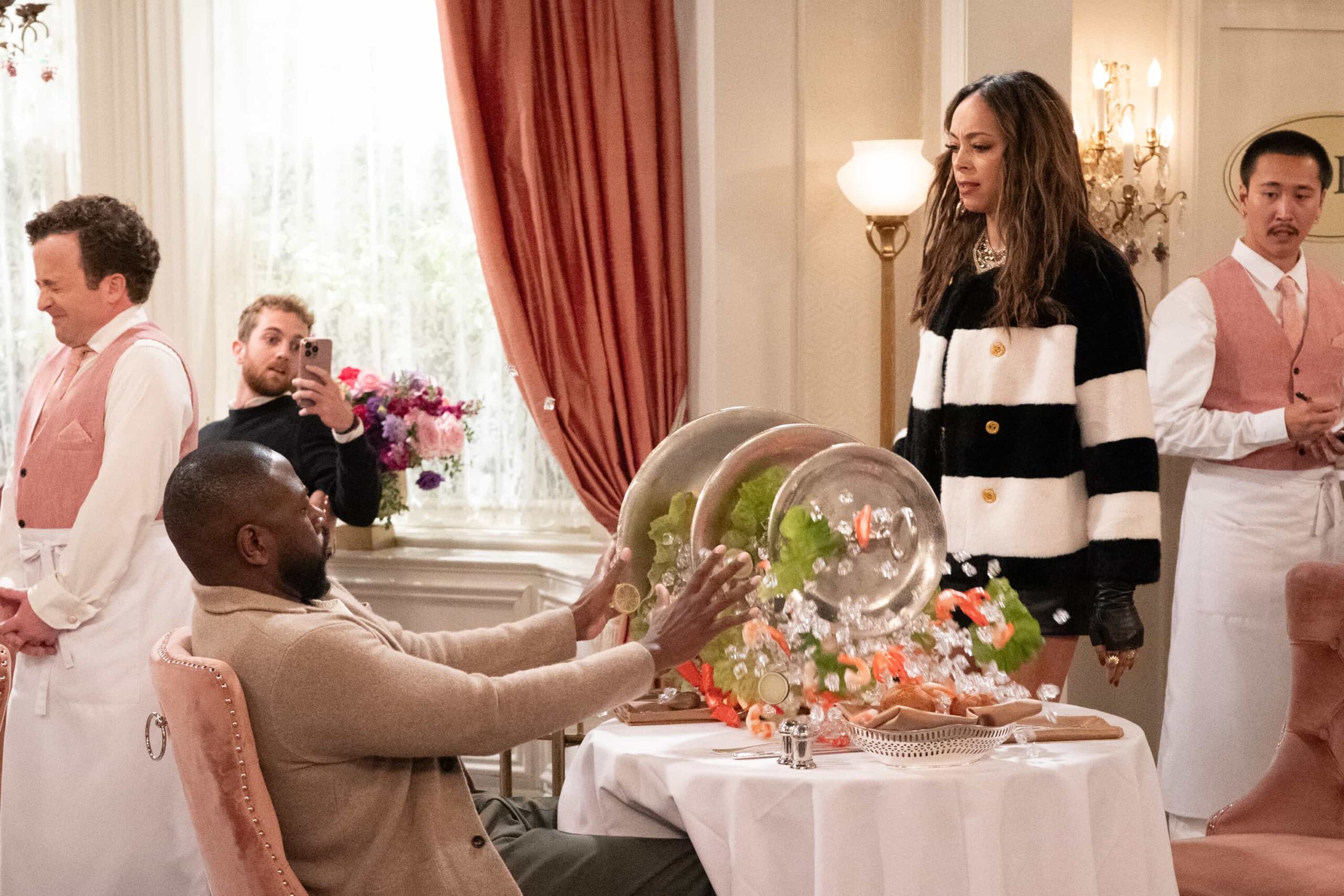 “Welcome to the Walk of Roses” – Calvin receives an unexpected honor that sparks mixed emotions, while Malcolm’s ghostwriting gig takes a wild turn after a viral outburst from his celebrity client, on THE NEIGHBORHOOD, Monday, Nov. 17 (8:00-8:30 PM, ET/PT) on the CBS Television Network, and streaming on Paramount+ (live and on-demand for Paramount+ Premium plan subscribers, or on-demand for Paramount+ Essential subscribers the day after the episode airs)*. Pictured: Sheaun McKinney as Malcolm and Amber West as Mercedes. Photo: Monty Brinton/CBS ©2025 CBS Broadcasting, Inc. All Rights Reserved.