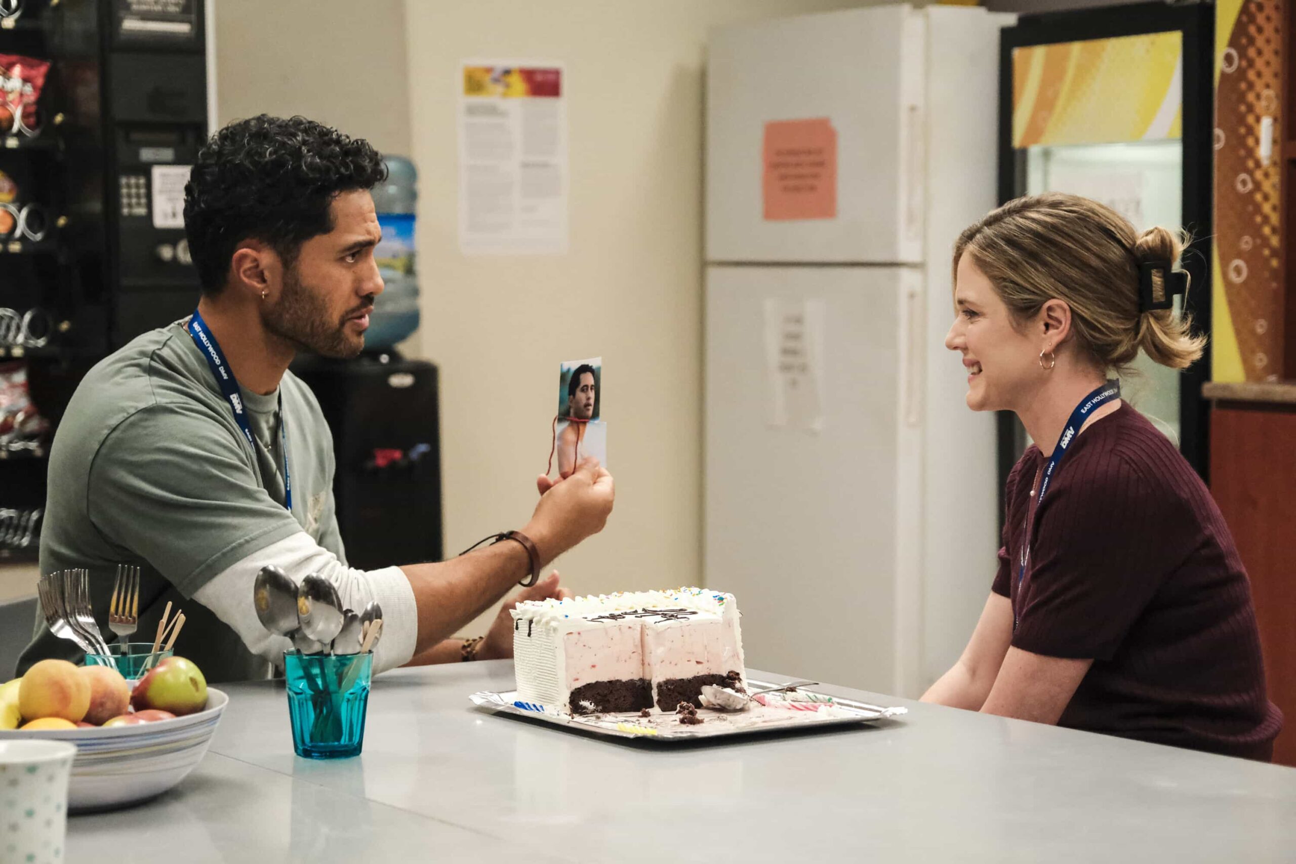 “Blindspot” – Colette is crushed to learn that Noa is dating someone. So, Ceci encourages Colette to fight for him using magic. Meanwhile, Barb tries to find out who is defacing DMV property with childishly inappropriate drawings, on DMV, Monday, Nov. 17 (8:30-9:00 PM, ET/PT) on the CBS Television Network, and streaming on Paramount+ (live and on-demand for Paramount+ Premium plan subscribers, or on-demand for Paramount+ Essential subscribers the day after the episode airs)*. Pictured L to R: Alex Tarrant as Noa and Harriet Dyer as Colette. Photo: Bertrand Calmeau/CBS ©2025 CBS Broadcasting, Inc. All Rights Reserved.