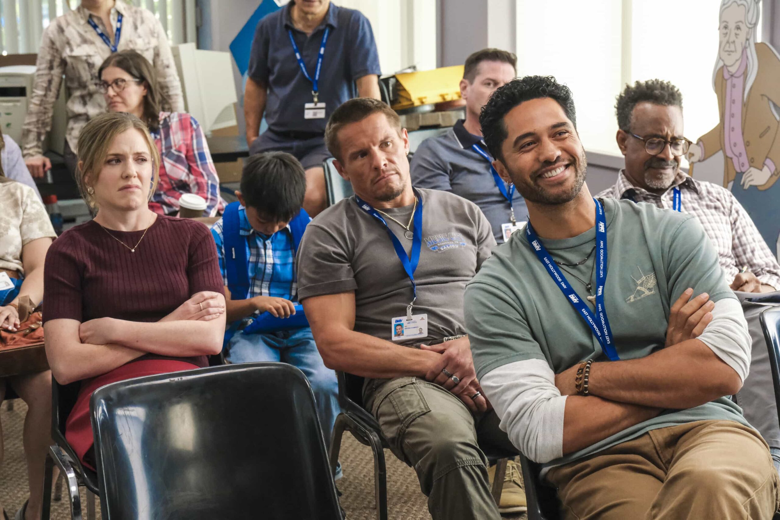 “Blindspot” – Colette is crushed to learn that Noa is dating someone. So, Ceci encourages Colette to fight for him using magic. Meanwhile, Barb tries to find out who is defacing DMV property with childishly inappropriate drawings, on DMV, Monday, Nov. 17 (8:30-9:00 PM, ET/PT) on the CBS Television Network, and streaming on Paramount+ (live and on-demand for Paramount+ Premium plan subscribers, or on-demand for Paramount+ Essential subscribers the day after the episode airs)*. Pictured L to R: Harriet Dyer as Colette, Tony Cavalero as Vic, Alex Tarrant as Noa, and Tim Meadows as Gregg. Photo: Bertrand Calmeau/CBS ©2025 CBS Broadcasting, Inc. All Rights Reserved.