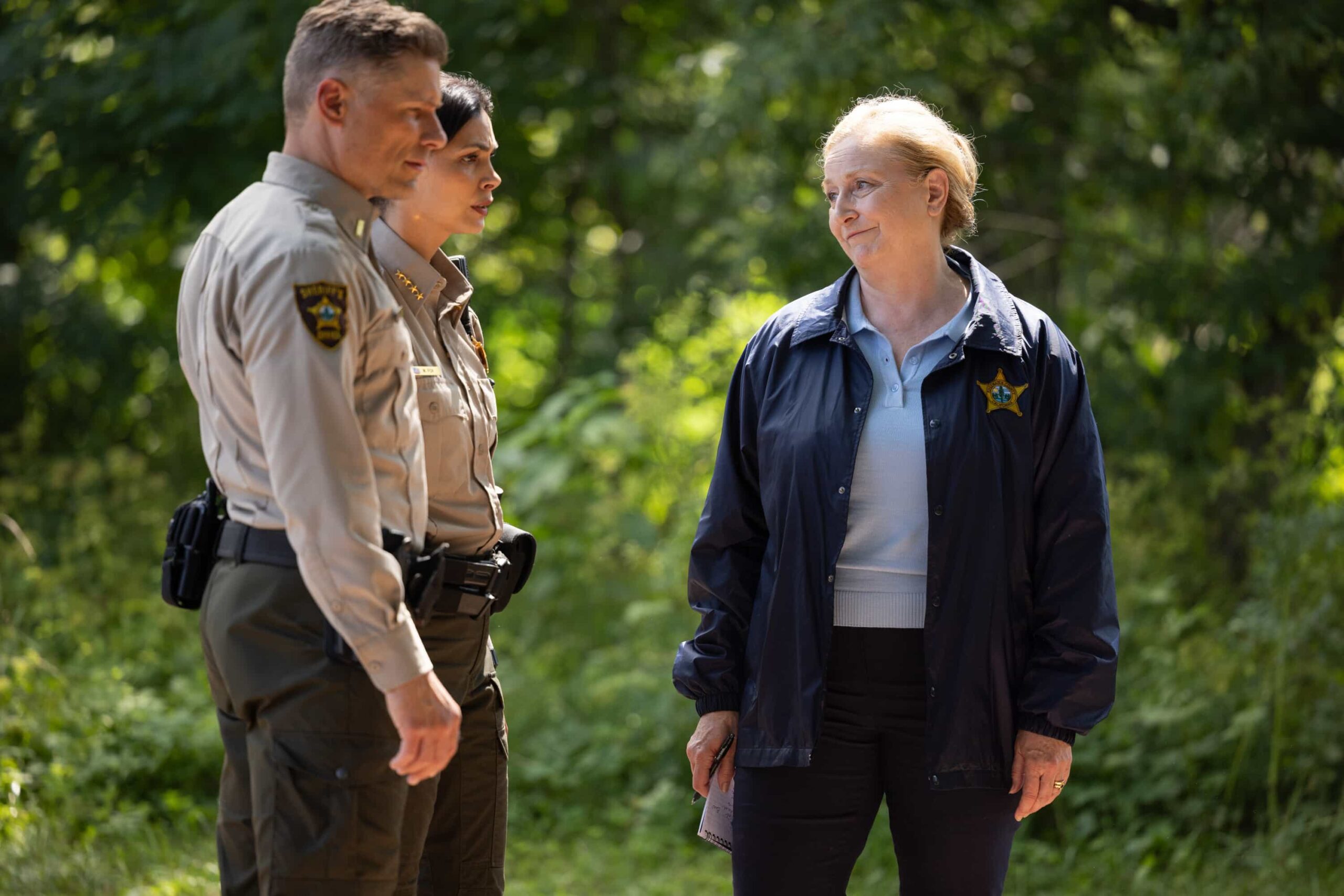 Sheriff Country “Exit Interview”Pictured: Matt Lauria as Boone, Morena Baccarin as Sheriff Mickey Fox and Catherine McNally as Carly. Photo: Darren Goldstein/CBS ©2025 CBS Broadcasting, Inc. All Rights Reserved.
