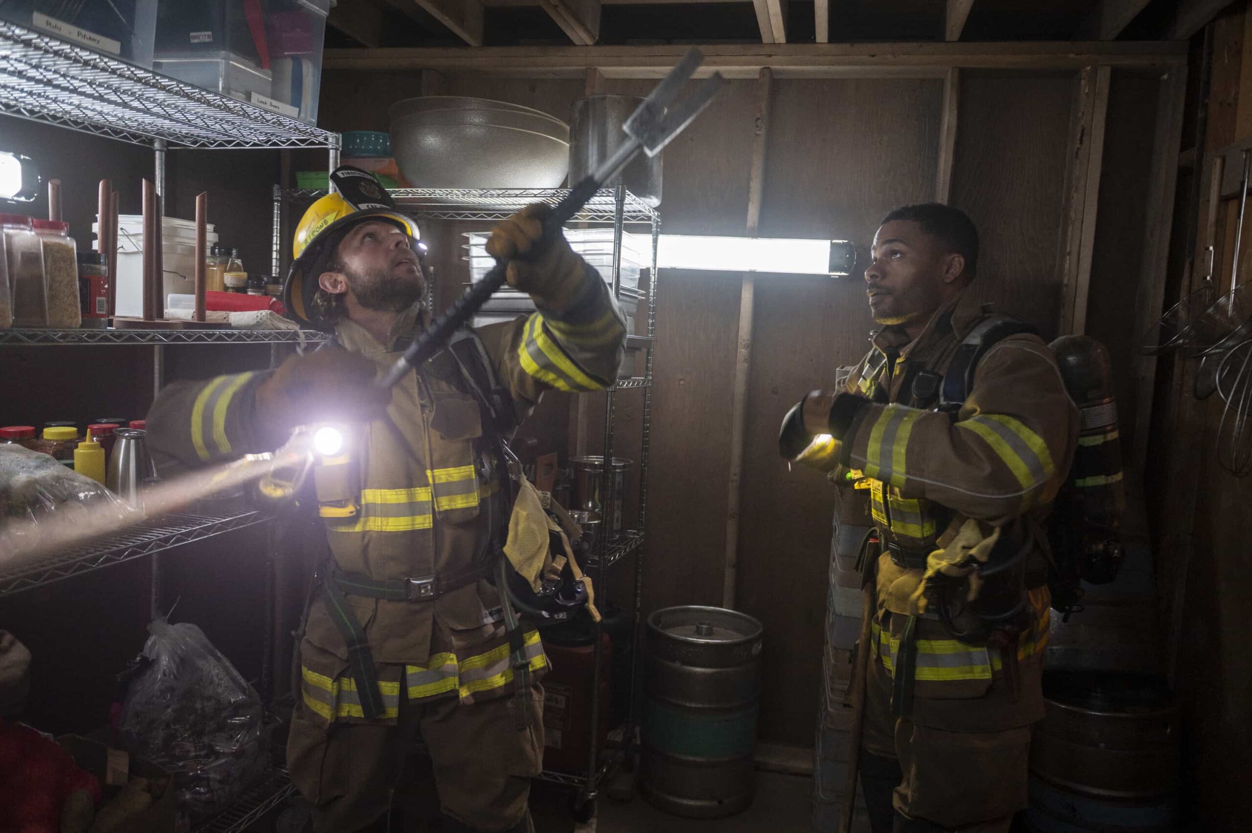 Fire Country Season 4 Episode 6 “Your Voice in My Head” – Station 42 responds to a dangerous fire at a beloved local smokehouse where Jake is forced to confront memories of his late father and the place they once shared, on FIRE COUNTRY, Friday, Nov. 21 (9:00-10:00 PM, ET/PT) on the CBS Television Network, and streaming on Paramount+ (live and on-demand for Paramount+ Premium plan subscribers, or on-demand for Paramount+ Essential subscribers the day after the episode airs). Pictured (L-R): Max Thieriot as Bode Leone and Jordan Calloway as Jake Crawford. Photo: Sergei Bachlakov/CBS ©2025 CBS Broadcasting, Inc. All Rights Reserved.