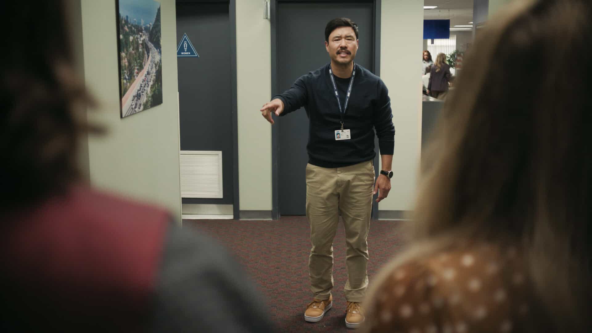 “There Is No I in DMV” – Barb takes the team on a field trip to the rival North Hollywood branch to learn the secrets of their success. She begins to doubt herself after meeting their charismatic manager, Beau (Randall Park). Meanwhile, Gregg and Vic get in Colette’s head that Noa prefers risk-takers, on DMV, Monday, Nov. 24 (9:30-10:00 PM, ET/PT) on the CBS Television Network, and streaming on Paramount+ (live and on-demand for Paramount+ Premium plan subscribers, or on-demand for Paramount+ Essential subscribers the day after the episode airs)*. Pictured: Randall Park as Beau Young. Photo: CBS ©2025 CBS Broadcasting, Inc. All Rights Reserved. Highest quality screengrab available.