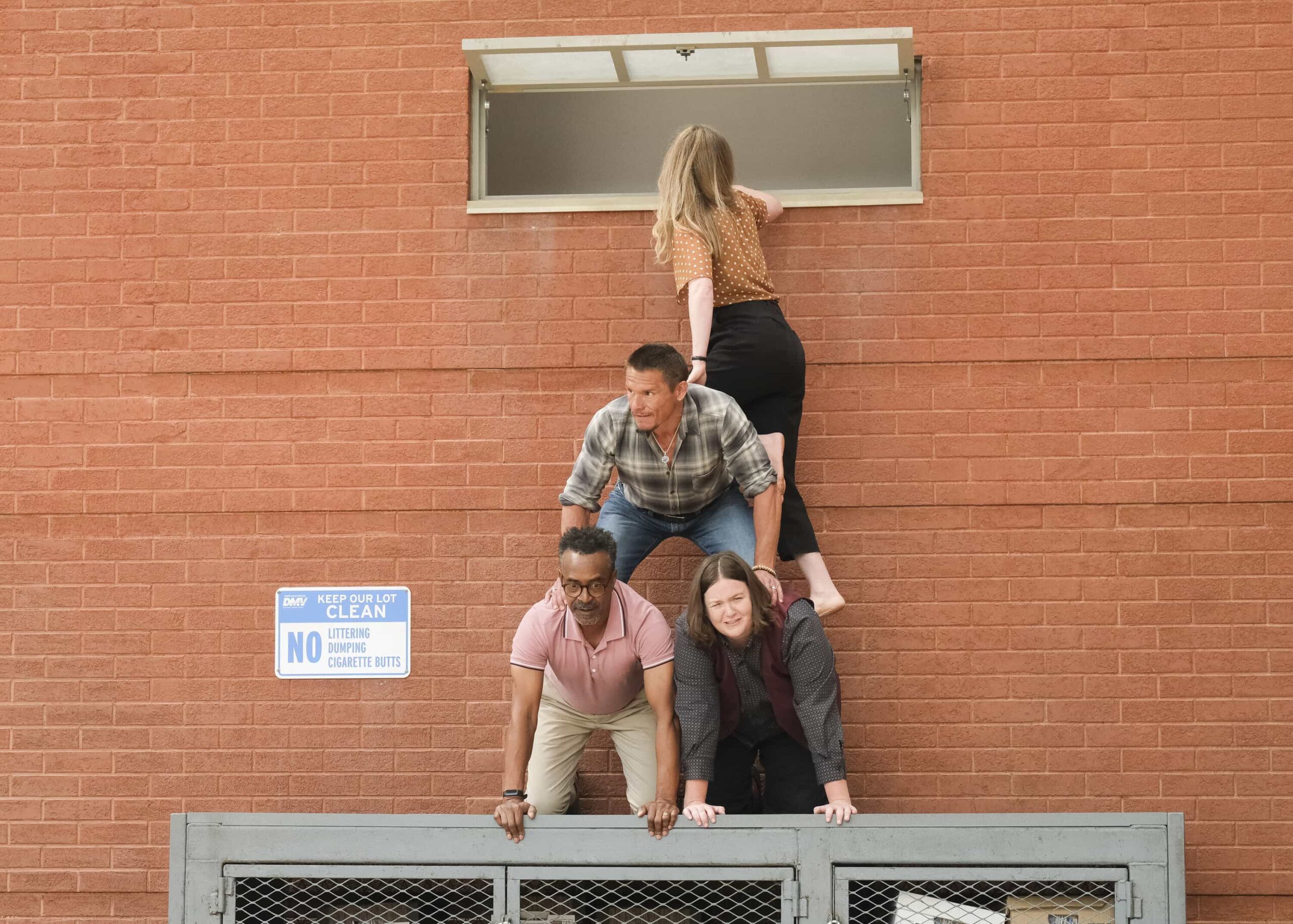 DMV Season 1 Episode 7  “There Is No I in DMV” – Barb takes the team on a field trip to the rival North Hollywood branch to learn the secrets of their success. She begins to doubt herself after meeting their charismatic manager, Beau (Randall Park). Meanwhile, Gregg and Vic get in Colette’s head that Noa prefers risk-takers, on DMV, Monday, Nov. 24 (9:30-10:00 PM, ET/PT) on the CBS Television Network, and streaming on Paramount+ (live and on-demand for Paramount+ Premium plan subscribers, or on-demand for Paramount+ Essential subscribers the day after the episode airs)*. Pictured L to R: Harriet Dyer as Colette, Tim Meadows as Gregg, Tony Cavalero as Vic, and Molly Kearney as Barbara. Photo: Bertrand Calmeau/CBS ©2025 CBS Broadcasting, Inc. All Rights Reserved.