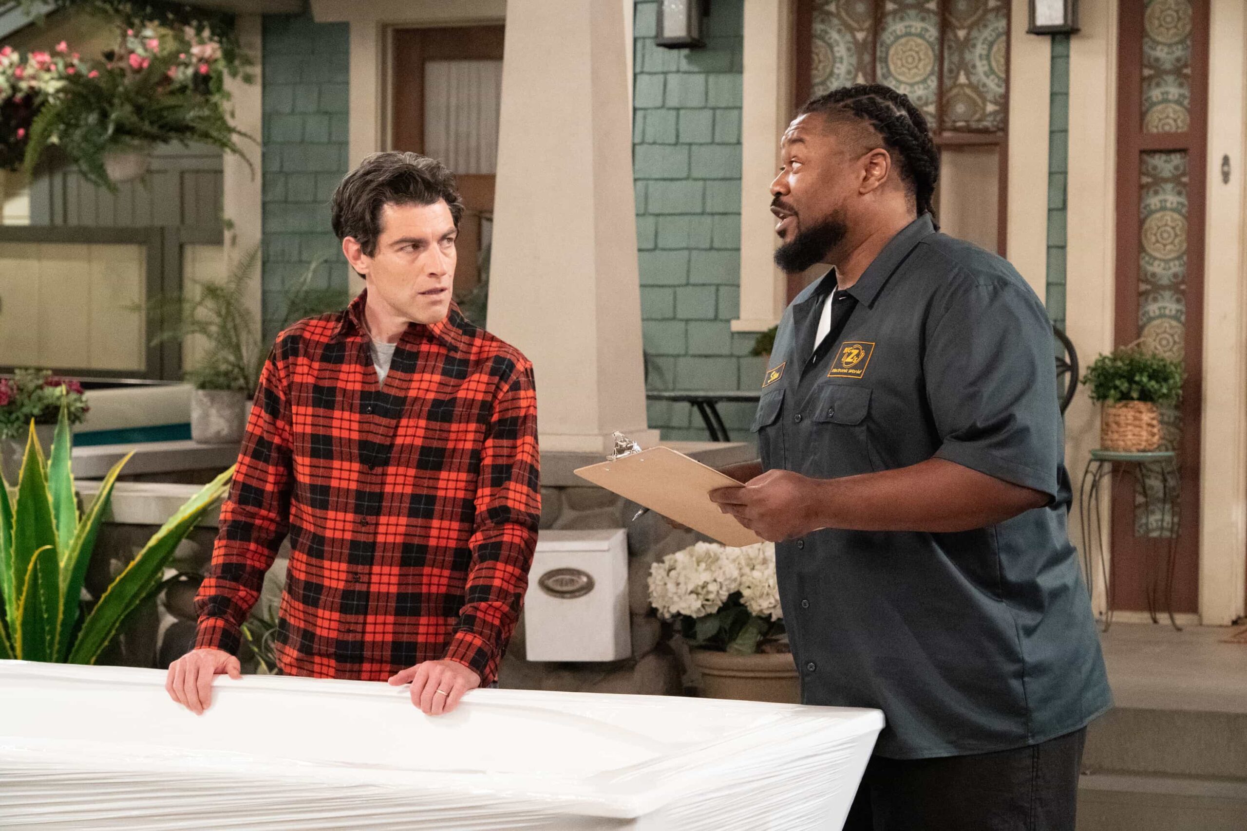 The Neighborhood Season 8 Episode 7 “Welcome to Babies and Bathwater” – Dave’s ambitious home improvement plans take a turn, prompting Calvin to step in, while Malcolm seeks Gemma’s help to overcome writer’s block. Meanwhile, Tina’s suggestion for Daphne sparks a parenting dilemma for Courtney, on THE NEIGHBORHOOD, Monday, Dec. 1 at a special time (8:30-9:00 PM, ET/PT) on the CBS Television Network, and streaming on Paramount+ (live and on-demand for Paramount+ Premium subscribers, or on-demand for Paramount+ Essential subscribers the day after the episode airs)*. Pictured: Max Greenfield as Dave and Clayton Thomas as Stan. Photo: Monty Brinton/CBS ©2025 CBS Broadcasting, Inc. All Rights Reserved.