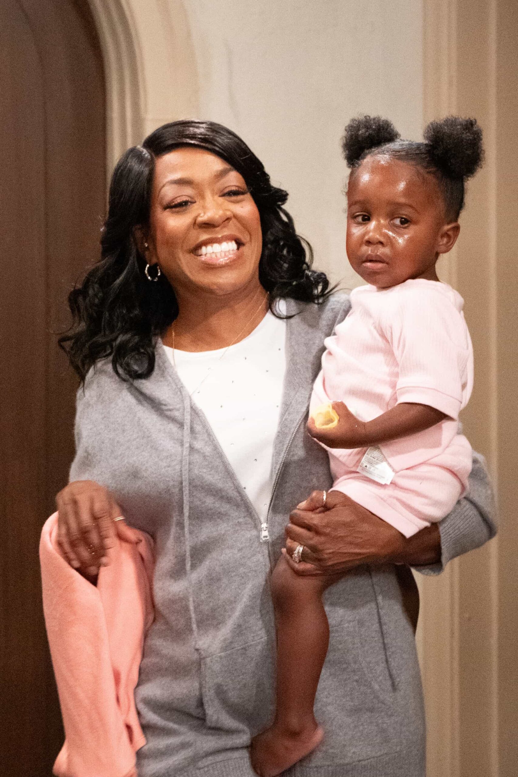 The Neighborhood Season 8 Episode 7 “Welcome to Babies and Bathwater” – Dave’s ambitious home improvement plans take a turn, prompting Calvin to step in, while Malcolm seeks Gemma’s help to overcome writer’s block. Meanwhile, Tina’s suggestion for Daphne sparks a parenting dilemma for Courtney, on THE NEIGHBORHOOD, Monday, Dec. 1 at a special time (8:30-9:00 PM, ET/PT) on the CBS Television Network, and streaming on Paramount+ (live and on-demand for Paramount+ Premium subscribers, or on-demand for Paramount+ Essential subscribers the day after the episode airs)*. Pictured: Tichina Arnold as Tina and Ky’elle and Ky’aire Delery as Baby Daphne. Photo: Monty Brinton/CBS ©2025 CBS Broadcasting, Inc. All Rights Reserved.