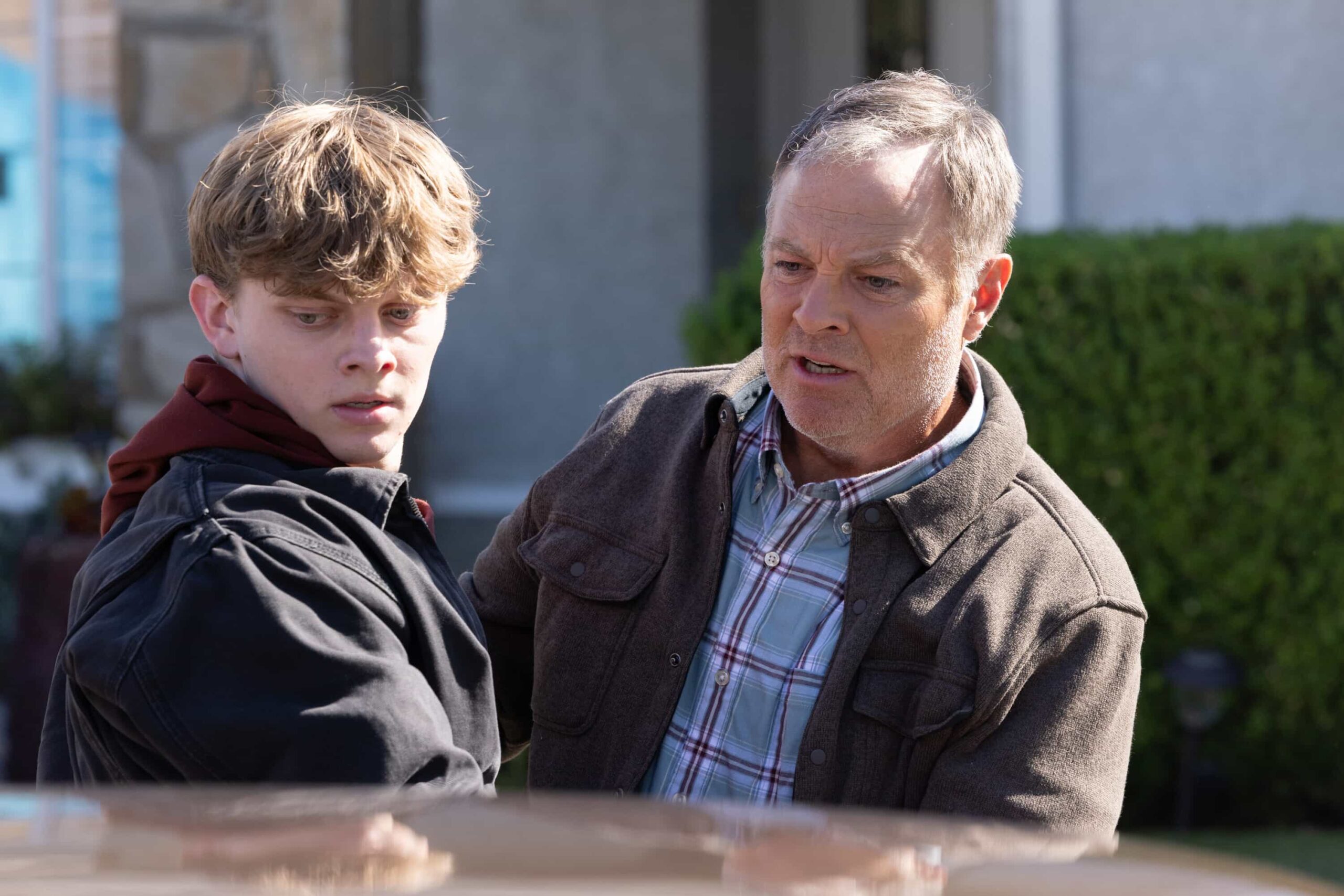 “God Only Knows” – A kidnapped teen leads the team to a Navy SEAL who survived captivity by the Taliban but may have committed murder after returning home. Also, Jimmy finally shares his findings about the mysterious death of Parker’s mother with his boss, on the CBS Original series NCIS, Tuesday, Dec. 2 (8:00-9:00 PM, ET/PT) on the CBS Television Network, and streaming on Paramount+ (live and on demand for Paramount+ Premium plan subscribers, or on demand for Paramount+ Essential subscribers the day after the episode airs)*. Pictured: Noah Ziggy James as Jacob Larson and Michael Buie as Hank Larson. Photo: Sonja Flemming/CBS ©2025 CBS Broadcasting, Inc. All Rights Reserved.