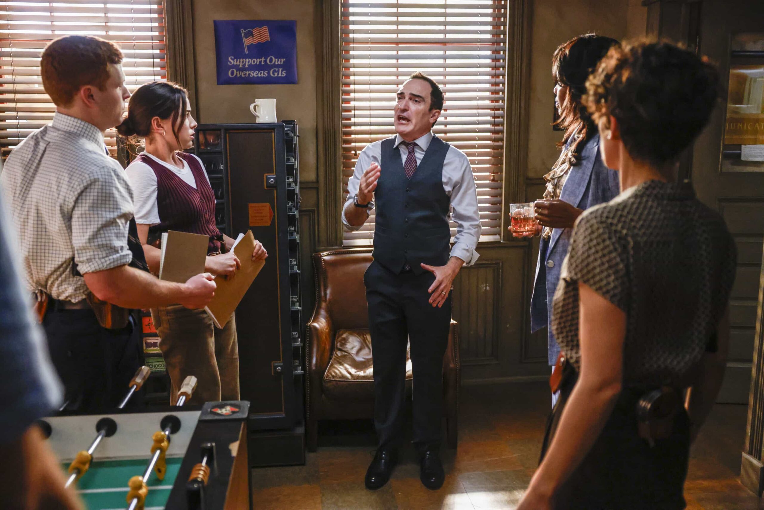 “Crazy Little Thing Called Love” – The team investigates the murder of a Marine who had recently been handpicked for a classified mission. Also, Wheeler’s personal life is upended, Lala is thrown by unexpected news from Vera, and Gibbs and Diane double-date with Randy and his wife, on NCIS: ORIGINS, Tuesday, Dec. 2 (9:00-10:00 PM, ET/PT) on the CBS Television Network, and streaming on Paramount+ (live and on demand for Paramount+ Premium plan subscribers, or on demand for Paramount+ Essential subscribers the day after the episode airs)*.  Pictured L to R:  Caleb Foote as Bernard “Randy” Randolf, Mariel Molino as Cecilia “Lala” Dominguez, Patrick Fischler as Cliff Walker and Tyla Abercrumbie as Mary Jo Hayes and Diany Rodriguez as Vera Strickland.  Photo: Sonja Flemming/CBS ©2025 CBS Broadcasting, Inc. All Rights Reserved.