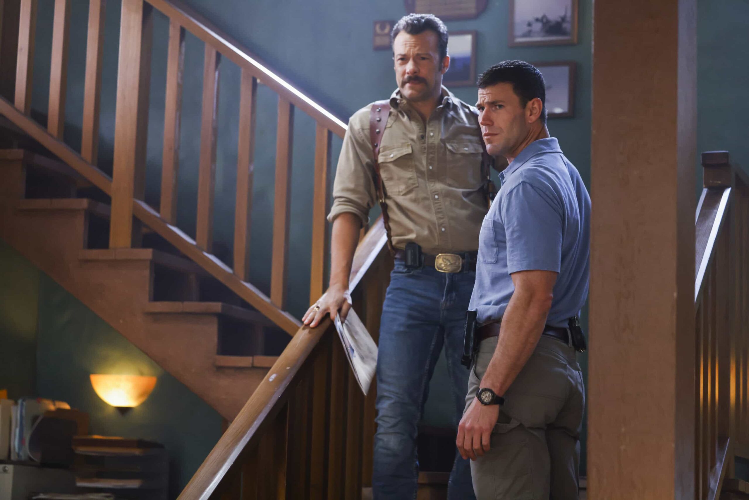 “Crazy Little Thing Called Love” – The team investigates the murder of a Marine who had recently been handpicked for a classified mission. Also, Wheeler’s personal life is upended, Lala is thrown by unexpected news from Vera, and Gibbs and Diane double-date with Randy and his wife, on NCIS: ORIGINS, Tuesday, Dec. 2 (9:00-10:00 PM, ET/PT) on the CBS Television Network, and streaming on Paramount+ (live and on demand for Paramount+ Premium plan subscribers, or on demand for Paramount+ Essential subscribers the day after the episode airs)*.  Pictured L to R: Kyle Schmid as Mike Franks and Austin Stowell as Leroy Jethro Gibbs.  Photo: Sonja Flemming/CBS ©2025 CBS Broadcasting, Inc. All Rights Reserved.