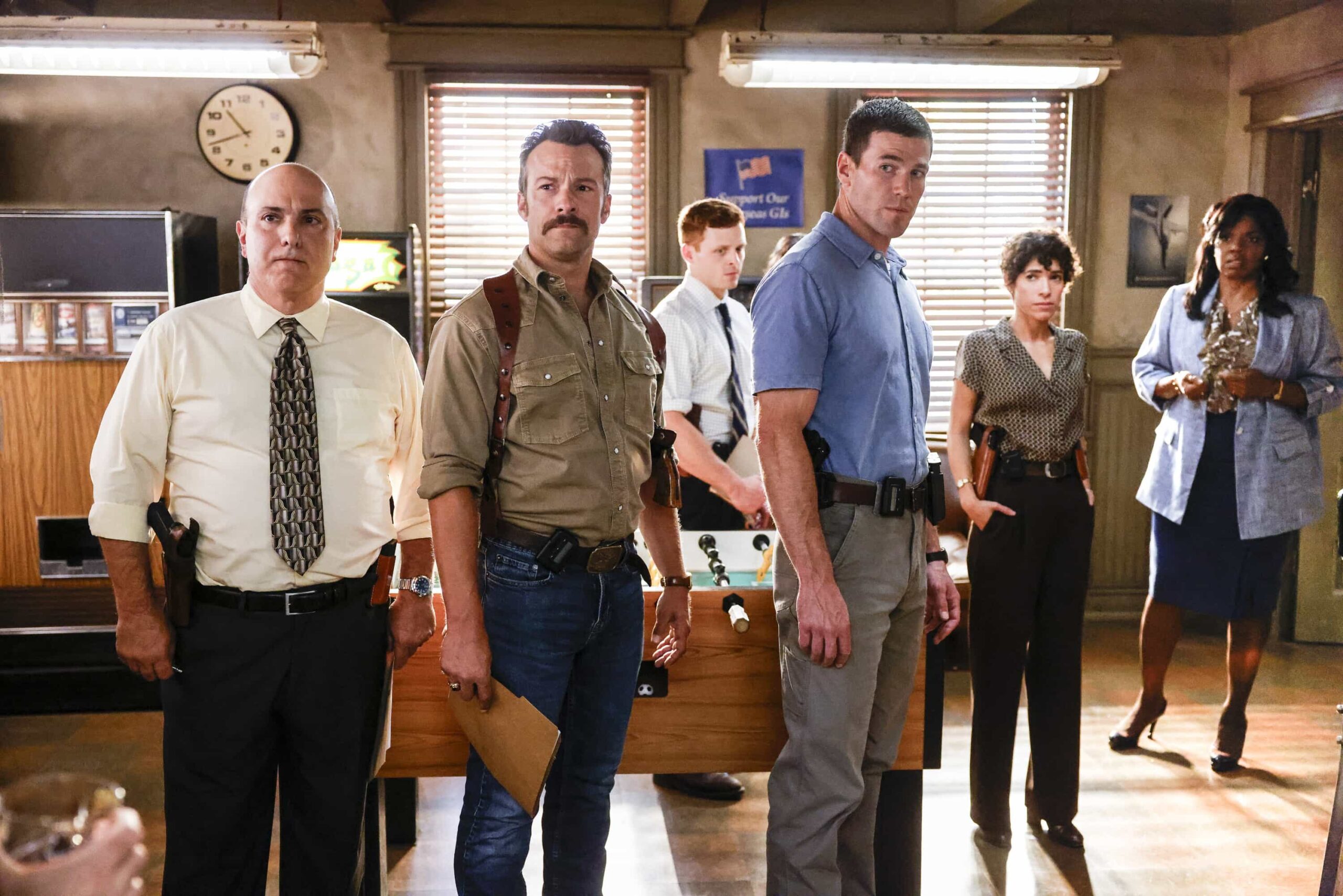 “Crazy Little Thing Called Love” – The team investigates the murder of a Marine who had recently been handpicked for a classified mission. Also, Wheeler’s personal life is upended, Lala is thrown by unexpected news from Vera, and Gibbs and Diane double-date with Randy and his wife, on NCIS: ORIGINS, Tuesday, Dec. 2 (9:00-10:00 PM, ET/PT) on the CBS Television Network, and streaming on Paramount+ (live and on demand for Paramount+ Premium plan subscribers, or on demand for Paramount+ Essential subscribers the day after the episode airs)*.  Pictured L to R: Matthew Henderson as NIS Special Agent Carl Loughlin, Kyle Schmid as Mike Franks, Caleb Foote as Bernard “Randy” Randolf, Austin Stowell as Leroy Jethro Gibbs, Diany Rodriguez as Vera Strickland, and Tyla Abercrumbie as Mary Jo Hayes.  Photo: Sonja Flemming/CBS ©2025 CBS Broadcasting, Inc. All Rights Reserved.