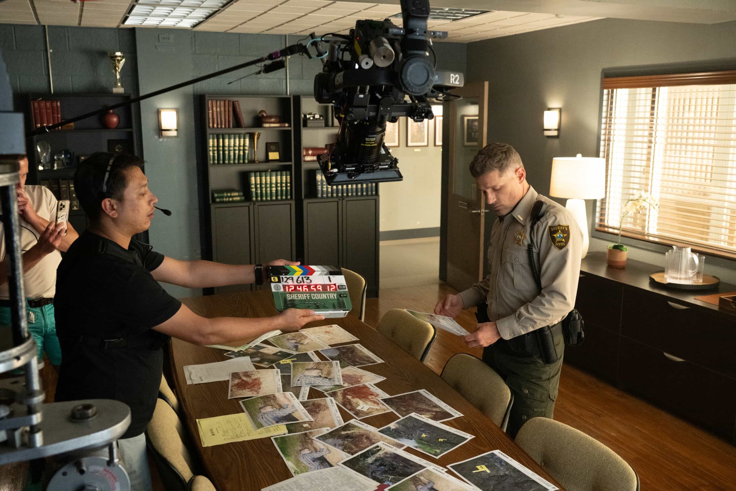 “Glory Days” BTS – While investigating a brutal assault at Edgewater High, Sheriff Mickey Fox uncovers a disturbing web of secrets, lies and abuse of power at the school, on SHERIFF COUNTRY, Friday, Dec. 5 (8:00-9:00 PM, ET/PT) on the CBS Television Network, and streaming on Paramount+ (live and on-demand for Paramount+ Premium plan subscribers, or on-demand for Paramount+ Essential subscribers the day after the episode airs)*. Pictured: Matt Lauria. Photo: Christos Kalohoridis/CBS ©2025 CBS Broadcasting, Inc. All Rights Reserved.