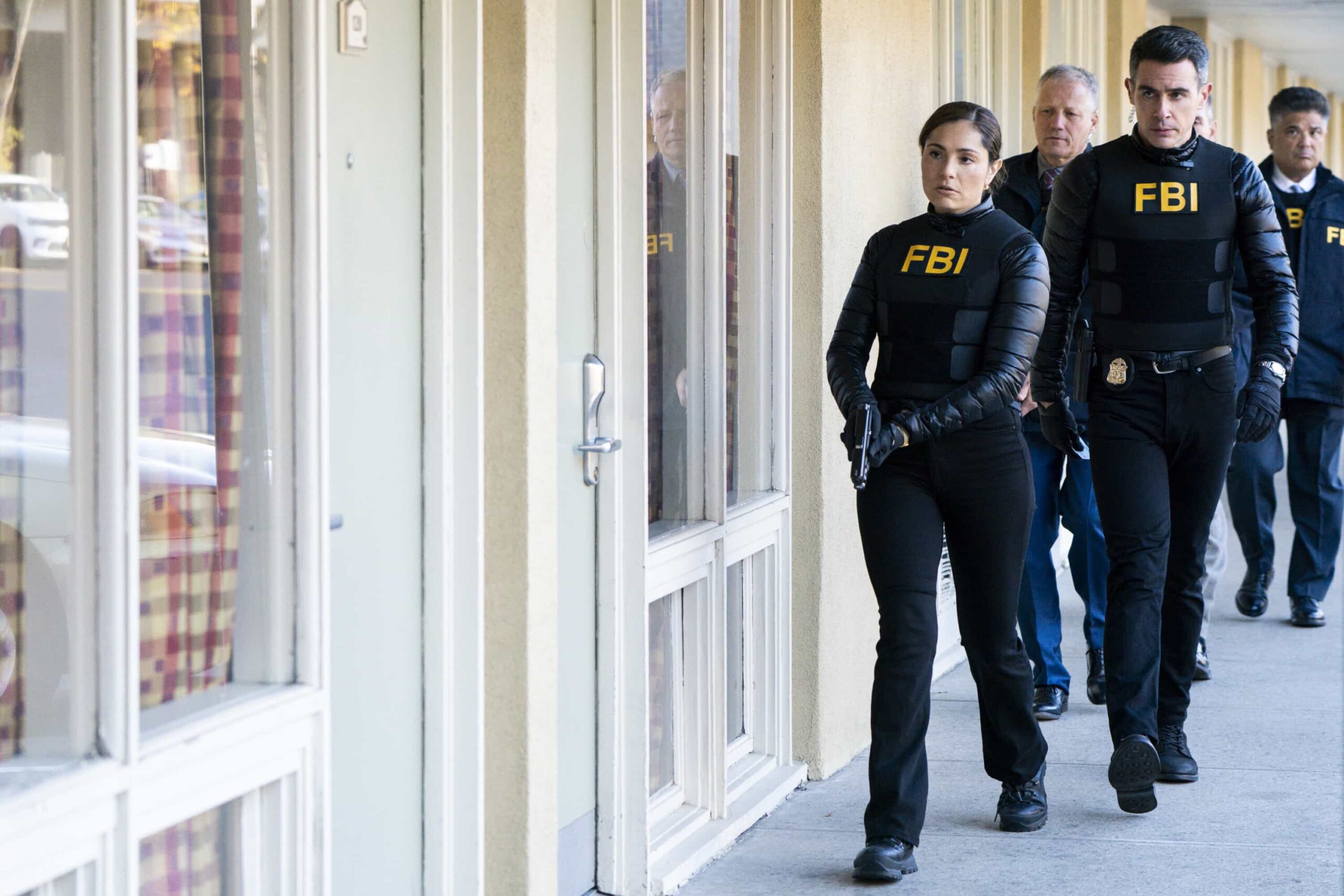 “Lone Wolf” – The team makes holiday plans while a seemingly straightforward murder investigation takes a shocking turn, putting the entire city of New York at risk, on back-to-back episodes of FBI, Monday, Dec. 15 (8:00-10:00 PM, ET/PT). Pictured (L-R): Juliana Aidén Martinez as Eva Ramos and John Boyd as Special Agent Stuart Scola. Photo: Bennett Raglin/CBS ©2025 CBS Broadcasting, Inc. All Rights Reserved.