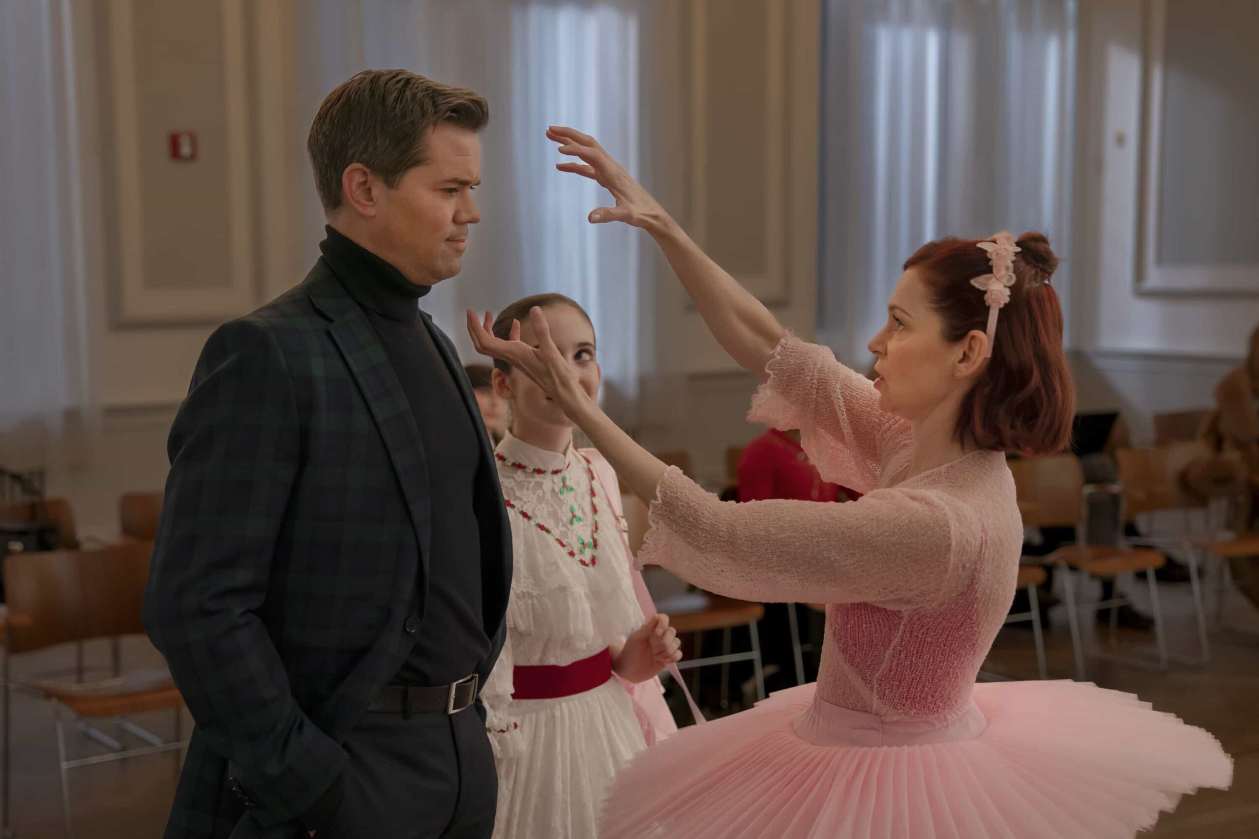 Elsbeth Season 3 Episode 10  “A Hard Nut to Crack” – When an avant-garde choreographer’s “Nutcracker” rehearsal turns deadly, Elsbeth leaps into the cutthroat world of New York ballet, on ELSBETH, Thursday, Dec. 18 (10:00-11:00 PM, ET/PT) .  Pictured (L-R): Andrew Rannells as Harris Parson, Willow McConnaughy as Noelle Bennett, Carrie Preston as Elsbeth Tascioni    Photo: Michael Parmelee/CBS ©2025 CBS Broadcasting, Inc. All Rights Reserved.