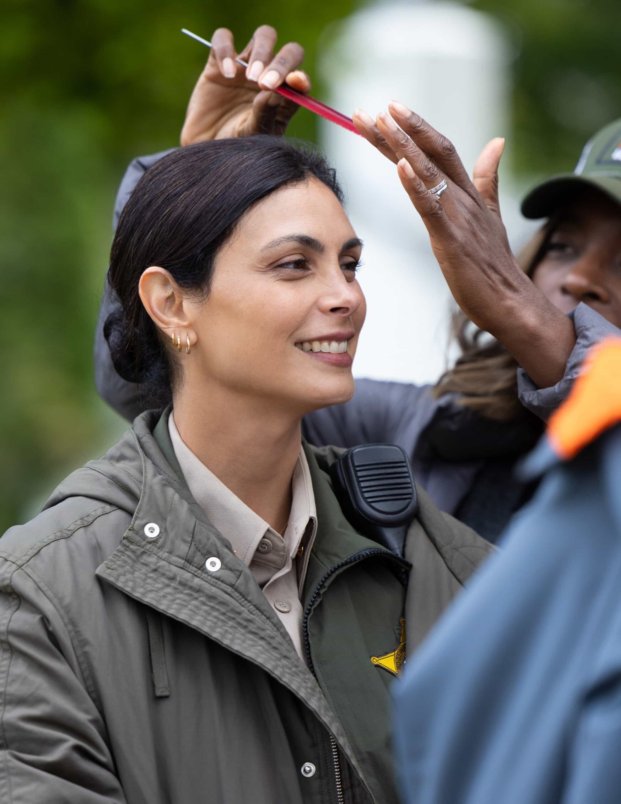 “Crucible, Part 1” BTS – After a father and son flee a secluded ranch run by one of Edgewater’s most power families, Mickey investigates disturbing allegations of abuse and uncovers dangerous secrets, which leads to a tense standoff and confrontation, on SHERIFF COUNTRY, Friday, Dec. 19 (8:00-9:00 PM, ET/PT). Pictured; Morena Baccarin. Photo: Darren Goldstein/CBS ©2025 CBS Broadcasting, Inc. All Rights Reserved.