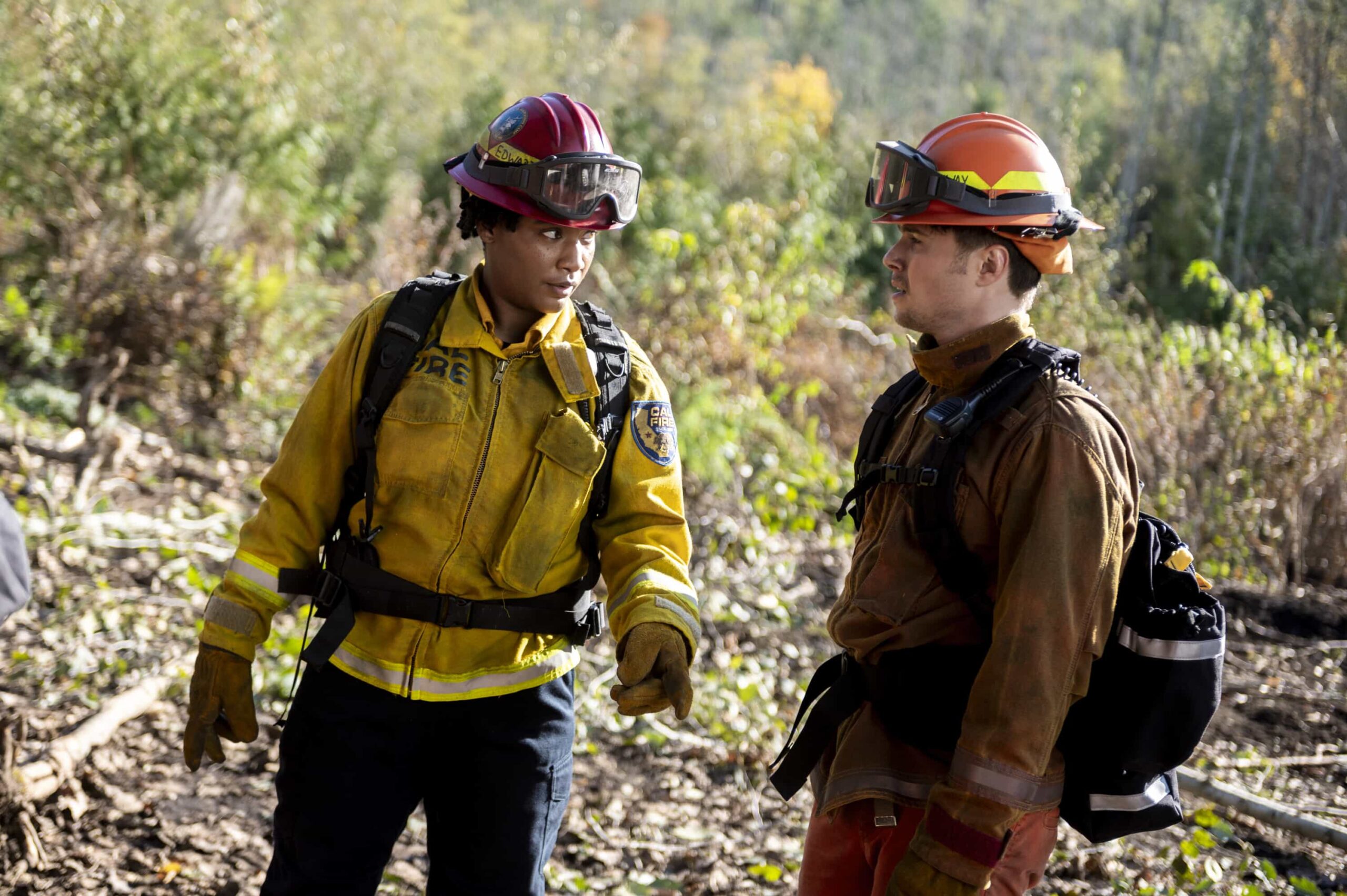 Fire Country Season 4 Episode 9 “Who Owns the Dirt” – When a red flag warning sets the stage for a volatile day, a turf war between Station 42 and neighboring Drake County comes to a head, on FIRE COUNTRY, Friday, Dec. 19 (9:00-10:00 PM, ET/PT). Pictured (L-R): Jules Latimer as Eve Edwards and Elias Kacavas as Tex. Photo: Sergei Bachlakov/CBS ©2025 CBS Broadcasting, Inc. All Rights Reserved.