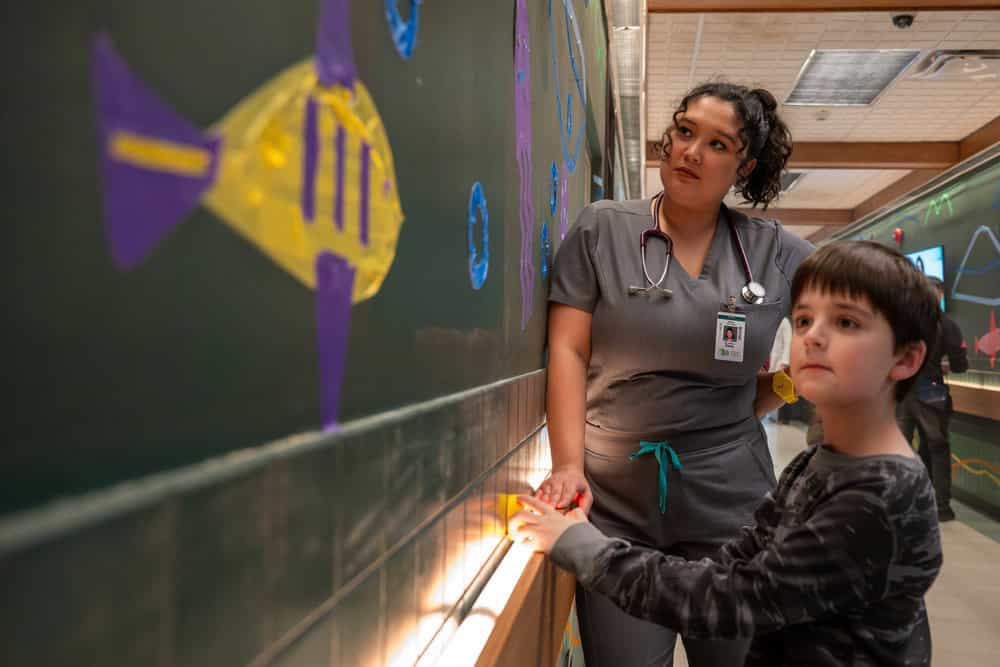 BRILLIANT MINDS -- "10 Minutes " Episode 211 -- Pictured: (l-r) Aury Krebs as Dr. Dana Dang, Henry Falk as Liam Marcus -- (Photo by: Pief Weyman/NBC)