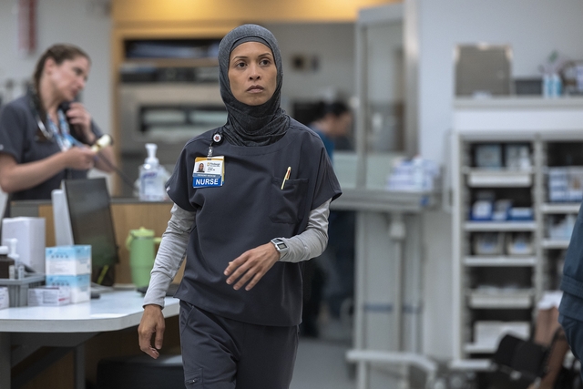 Santos shares Kylie's info w/Robby and Al-Hashimi. (Warrick Page/MAX)