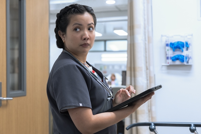 Reina hands Robby & Shena load of freezer bags w/ Carl’s meds & Supplements. (Warrick Page for MAX)