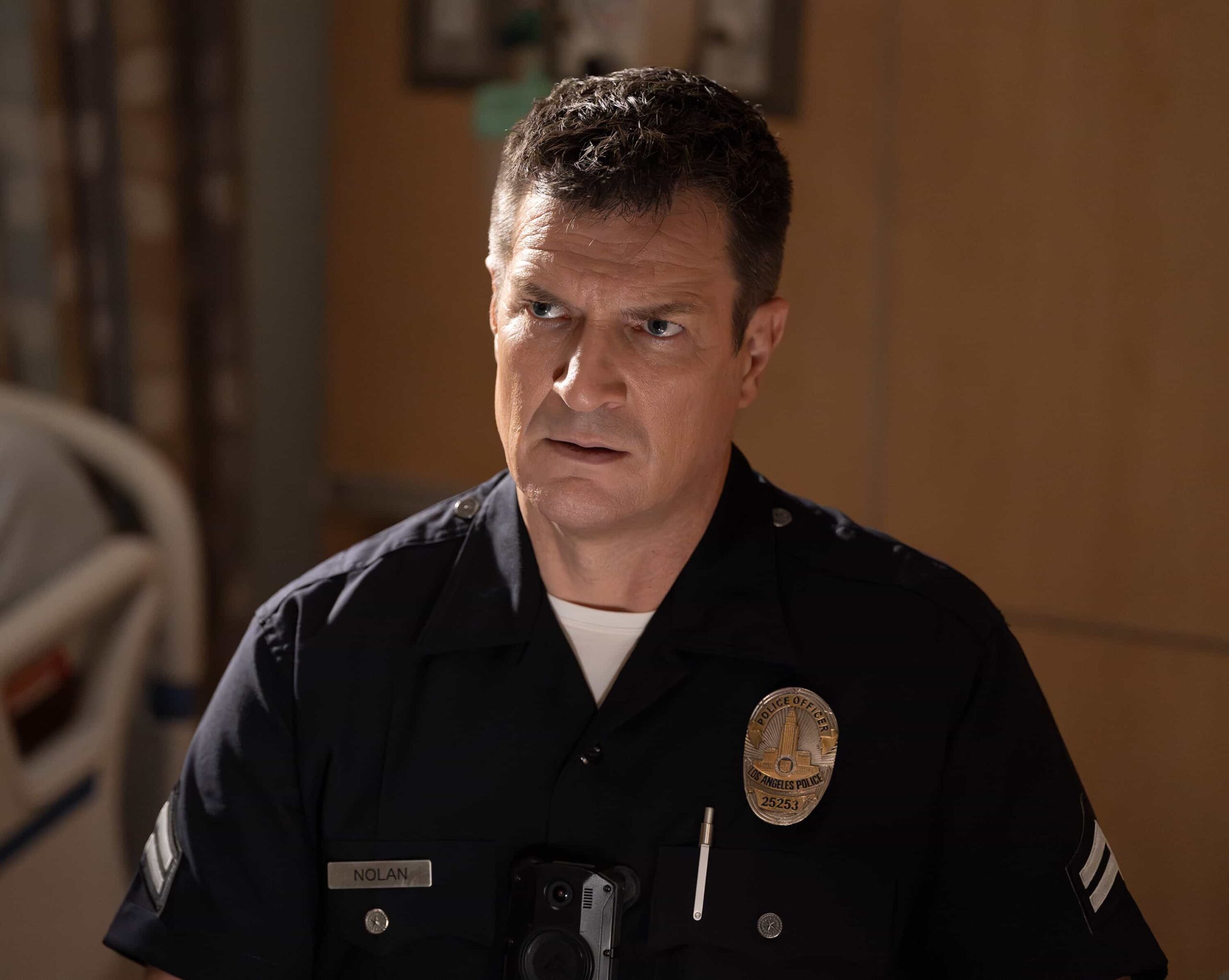 THE ROOKIE season 8 episode 4- “Cut and Run” - While out in the city, Nolan and Bailey witness a murder in public and immediately spring into action in the hopes of finding the person responsible. Meanwhile, Angela and Wesley have a big life decision that may affect their future. MONDAY, JAN. 26 (10:00-11:00 p.m. EST) on ABC. (Disney/Mike Taing) 
NATHAN FILLION