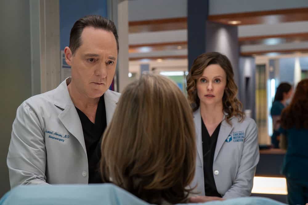 CHICAGO MED Season 11 Episode 11 still -- "Our So Called Lives" Episode 1111 -- Pictured: (l-r) Brennan Brown as Dr. Sam Abrams, Sarah Ramos as Dr. Caitlin Lenox -- (Photo by: Elizabeth Sisson/NBC)