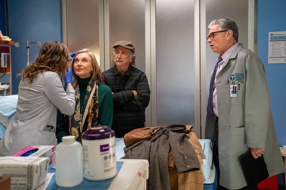 CHICAGO MED -- "Our So Called Lives" Episode 1111 -- Pictured: (l-r) Brenda Strong as Dr. Suzie Mankiewicz, Mark Linn-Baker as Dr. Howie Mankiewicz, Oliver Platt as Dr. Daniel Charles -- (Photo by: Elizabeth Sisson/NBC)