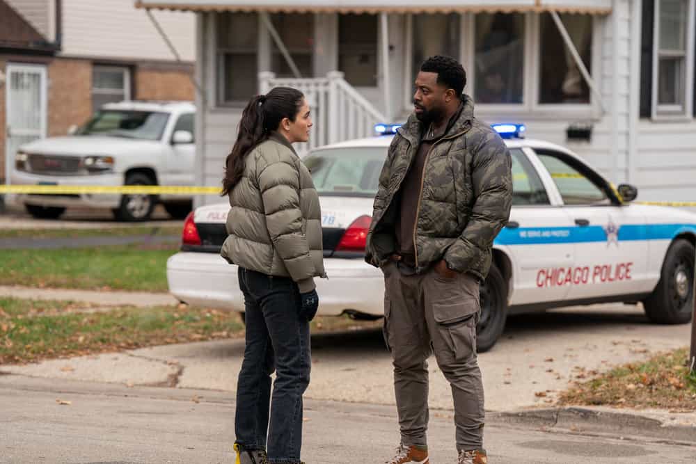 CHICAGO P.D. Season 13 Episode 11 still -- "On the Way" Episode 1311 -- Pictured: (l-r) Arienne Mandi as Eva Imani, LaRoyce Hawkins as Officer Kevin Atwater -- (Photo by: Elizabeth Sisson/NBC)