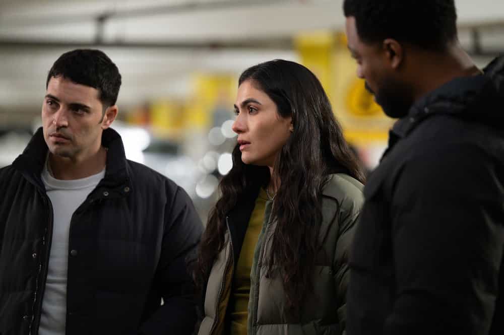 CHICAGO P.D. Season 13 Episode 12 Picture -- "Missing" Episode 1312 -- Pictured: (l-r) Benjamin Levy Aguilar as Dante Torres, Arienne Mandi as Eva Imani -- (Photo by: Lori Allen/NBC)