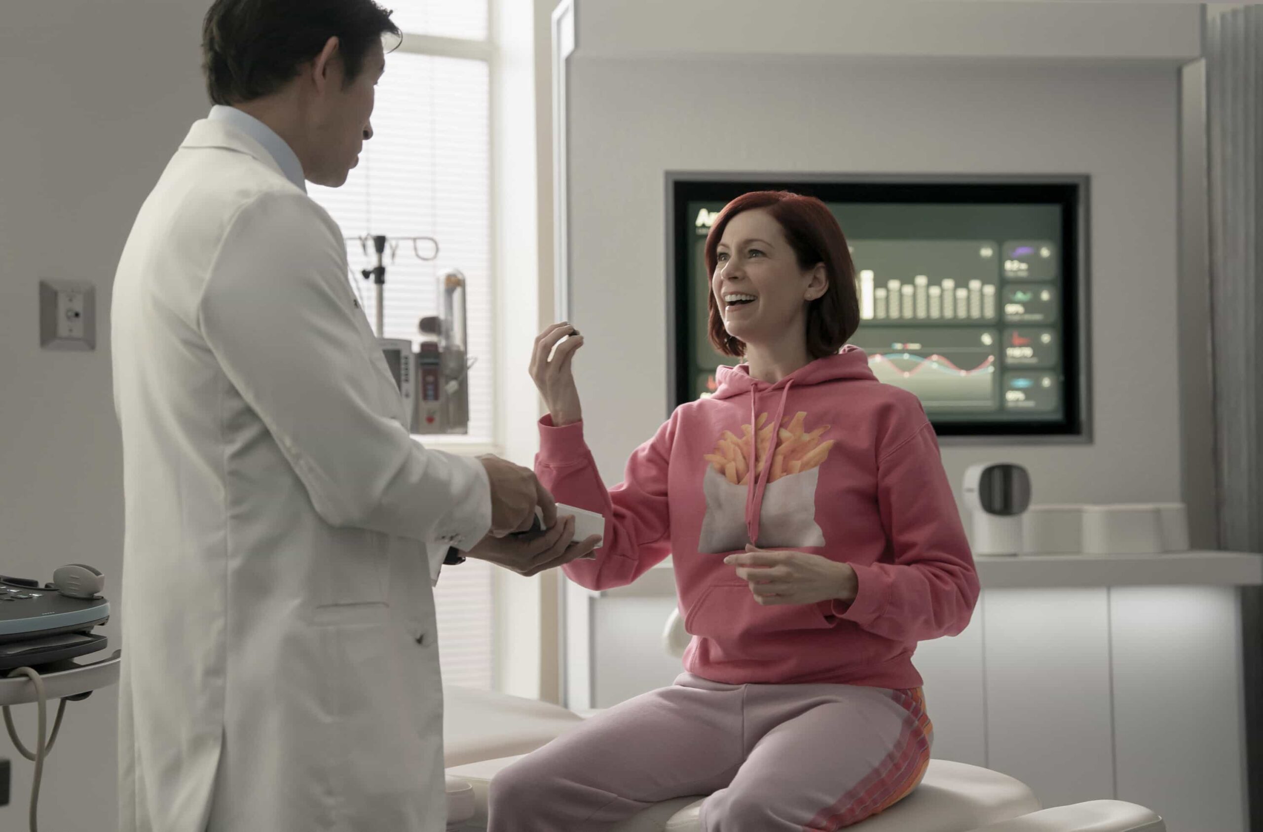 “Ol’Man Liver” – Elsbeth battles a wealthy biohacker (Hamish Linklater) who will do anything to stay young, including an extreme diet, vigorous exercise, and murder, on ELSBETH, Thursday, Feb. 26 (10:00-11:00 PM, ET/PT) on the CBS Television Network and streaming on Paramount+    Pictured (L-R): Jason Wayne Wong as Dr. Kim and  Carrie Preston as Elsbeth Tascioni  Photo: Michael Parmelee/CBS ©2025 CBS Broadcasting, Inc. All Rights Reserved.