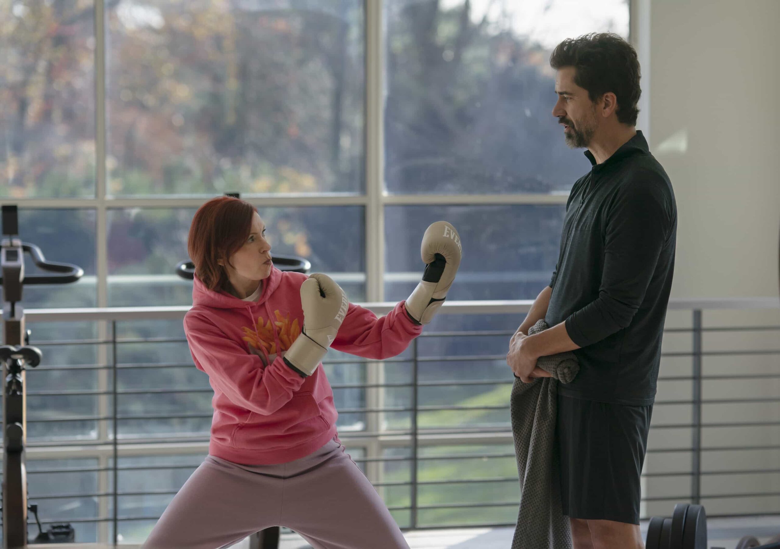 Elsbeth Season 3 Episode 11 Image Boxing “Ol’Man Liver” – Elsbeth battles a wealthy biohacker (Hamish Linklater) who will do anything to stay young, including an extreme diet, vigorous exercise, and murder, on ELSBETH, Thursday, Feb. 26 (10:00-11:00 PM, ET/PT) on the CBS Television Network and streaming on Paramount+   Pictured (L-R): Carrie Preston as Elsbeth Tascioni and Hamish Linklater as Archer Kopunek   Photo: Michael Parmelee/CBS ©2025 CBS Broadcasting, Inc. All Rights Reserved.
