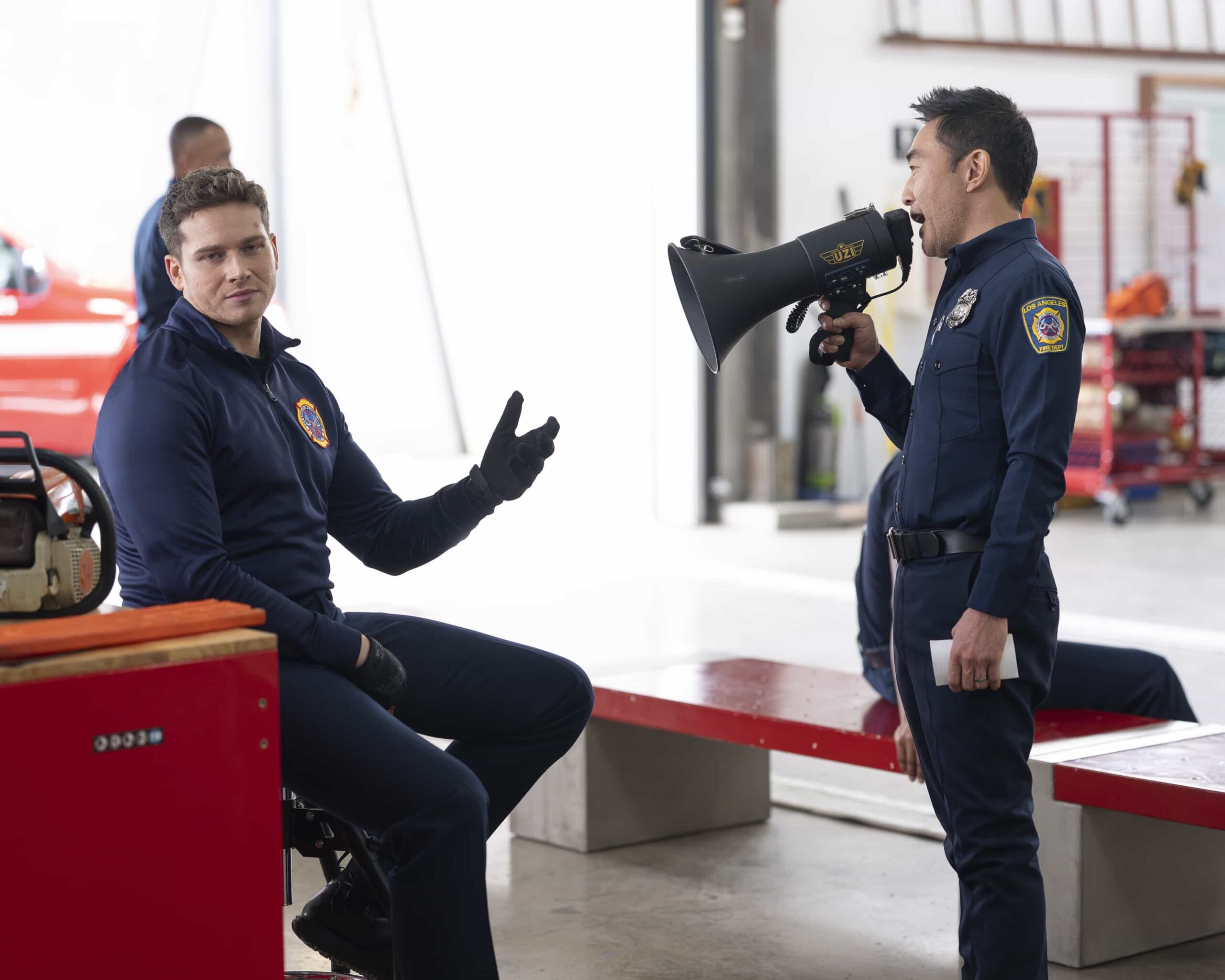 9-1-1 - “Going Once, Going Twice” - When a medical examiner becomes entangled in a dangerous situation during an autopsy, the 118 is called in to assist. Meanwhile, the 118 hosts an LAFD charity bachelor auction. THURSDAY, FEB. 26 (8:00-9:00 p.m. EST) on ABC. (Disney/Christopher Willard) 
OLIVER STARK, KENNETH CHOI