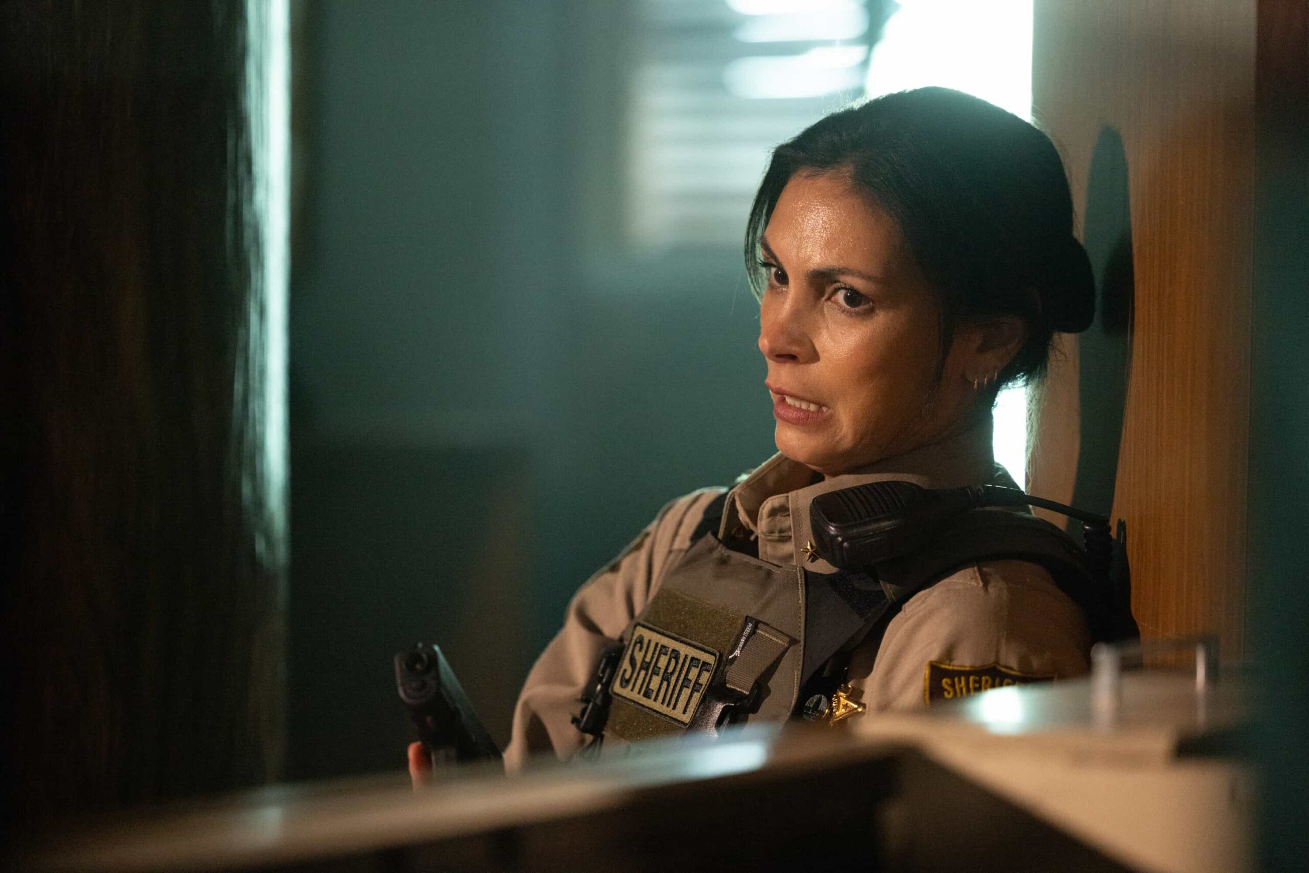 Sheriff Country Season 1 Episode 10 Photo "Crucible, Part 2" -- Coverage of the CBS Original Series SHERIFF COUNTRY, scheduled to air on the CBS Television Network.  Pictured: Marina Baccarin as Sheriff Mickey Fox. Photo: Darren Goldstein/CBS ©2025 CBS Broadcasting, Inc. All Rights Reserved.