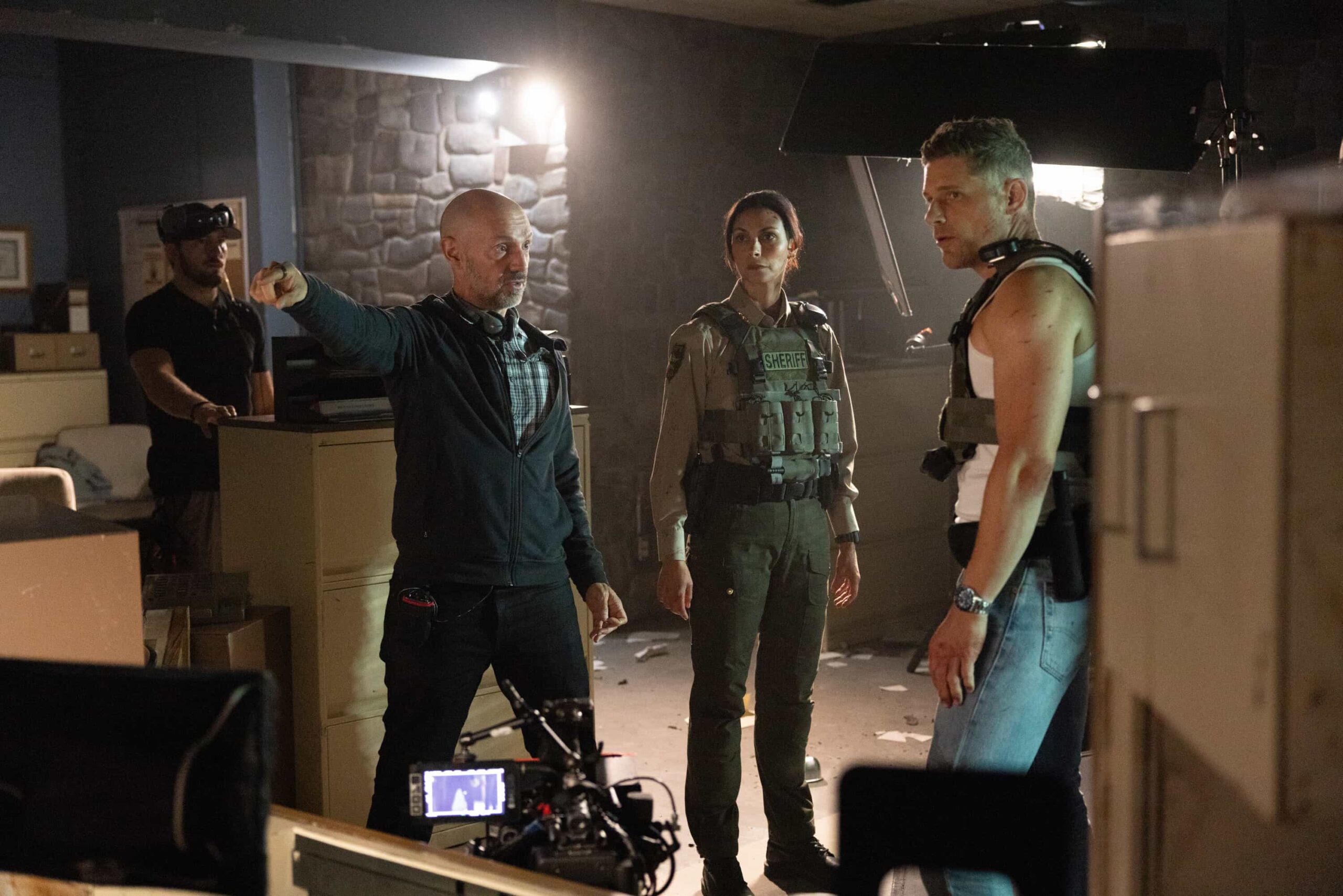 "Crucible, Part 2" -- Coverage of the CBS Original Series SHERIFF COUNTRY, scheduled to air on the CBS Television Network.  Pictured: Director Gonzalo Amat, Morena Baccarin and Matt Lauria. Photo: Darren Goldstein/CBS ©2025 CBS Broadcasting, Inc. All Rights Reserved.