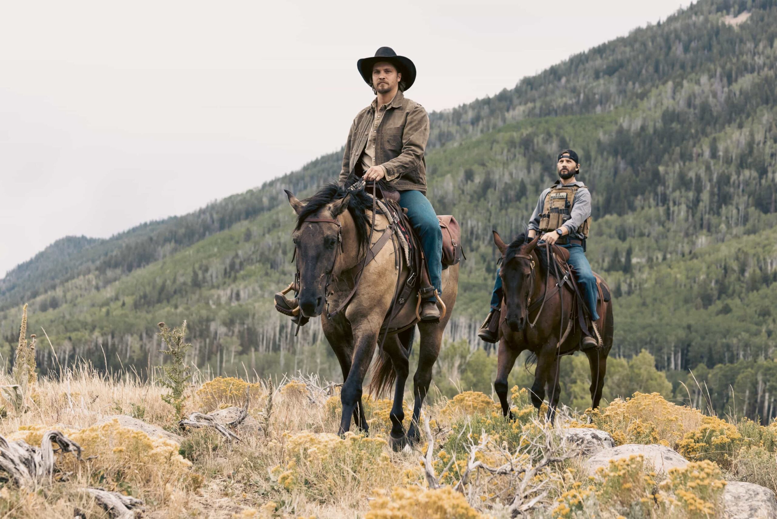 "Piya Wiconi" -- Coverage of the CBS Original Series MARSHALS, scheduled to air on the CBS Television Network.  Pictured (L-R): Luke Grimes as Kayce Dutton and Logan Marshall-Green as Pete Calvin.  Photo: Sonja Flemming/CBS ©2025 CBS Broadcasting, Inc. All Rights Reserved.