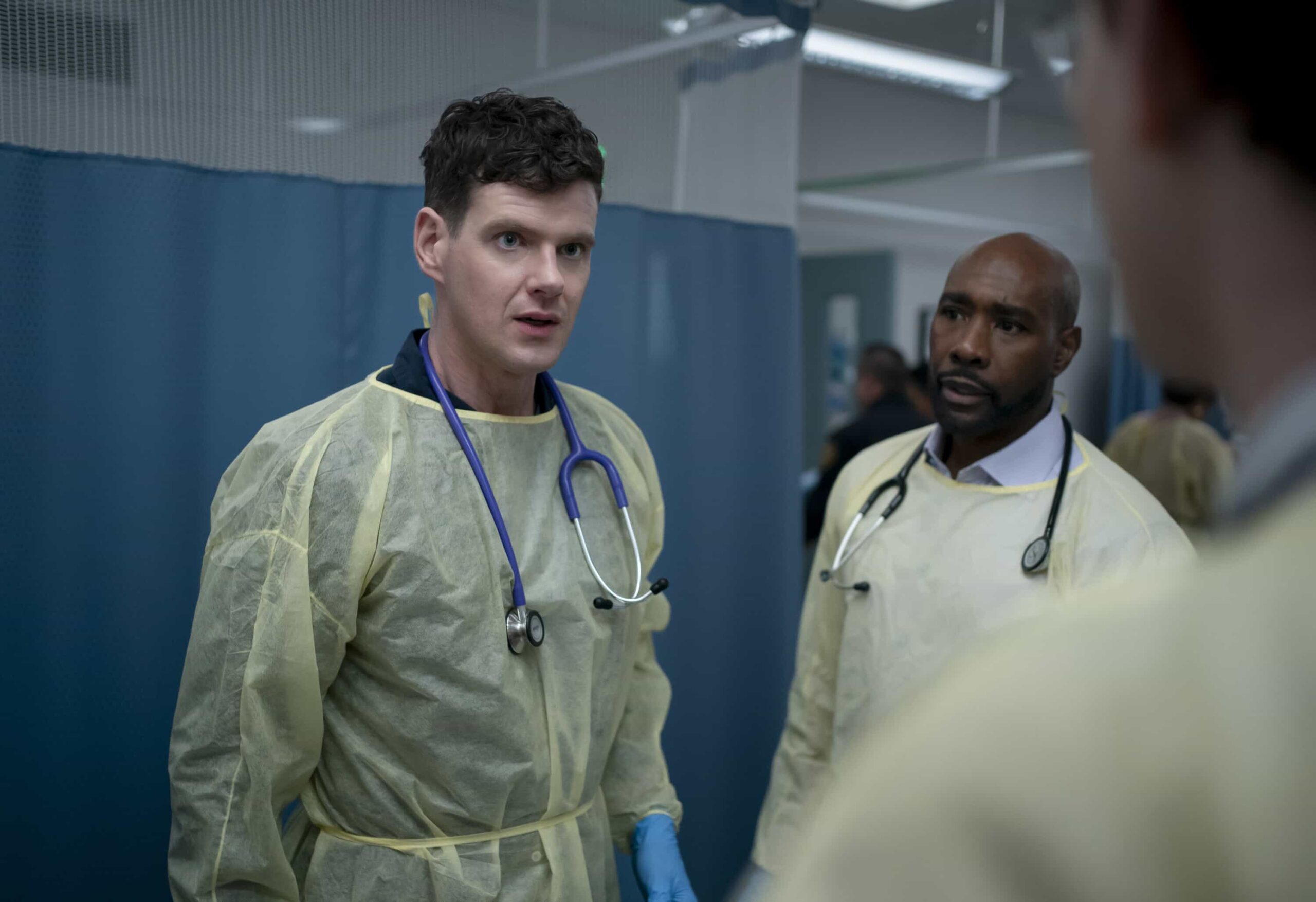 Watson Season 2 Episode 11 Picture “The Tunnel Under the Elms” – Watson and the fellows race against the clock to save a man and his pregnant wife from a terrifying sinkhole. Meanwhile, Ingrid’s future with her therapy group becomes unclear, on WATSON, Sunday, March 1 (10:00-11:00 PM, ET/PT) on the CBS Television Network, and streaming on Paramount+  Pictured (L-R): Peter Mark Kendall as Dr. Adam Croft and Morris Chestnut as Dr. John Watson   Photo: Colin Bentley/CBS ©2025 CBS Broadcasting, Inc. All Rights Reserved.