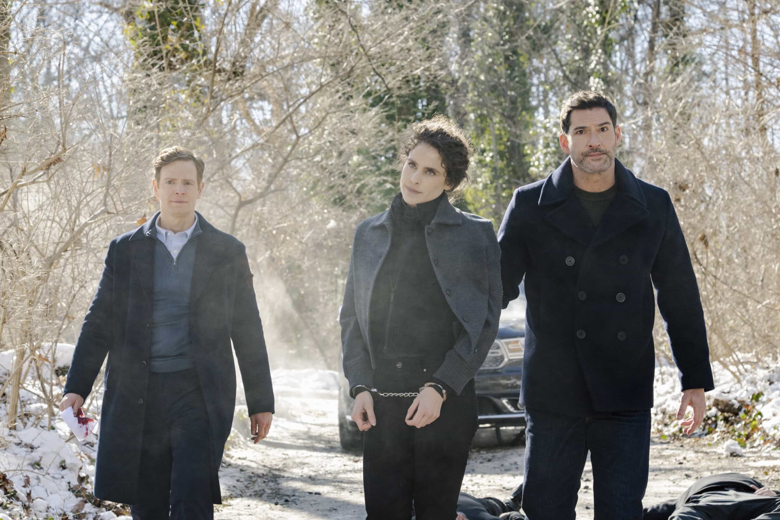 CIA Season 1 Episode 2 Image “Fatal Defect” – When a known smuggler is flagged at the New York border with unidentified cargo, Colin and Bill head upstate to track. To find this smuggler, they must enlist the help of a foreign intelligence officer looking to defect, on CIA, Monday, March 2 (10:00-11:00 PM, ET/PT). Pictured (L-R): Nick Gehlfuss as Special Agent Bill Goodman, Melinda Michael as Mona Azar, and Tom Ellis as CIA Case Officer Colin Glass.  Photo: Mark Schafer/CBS ©2026 CBS Broadcasting, Inc. All Rights Reserved.