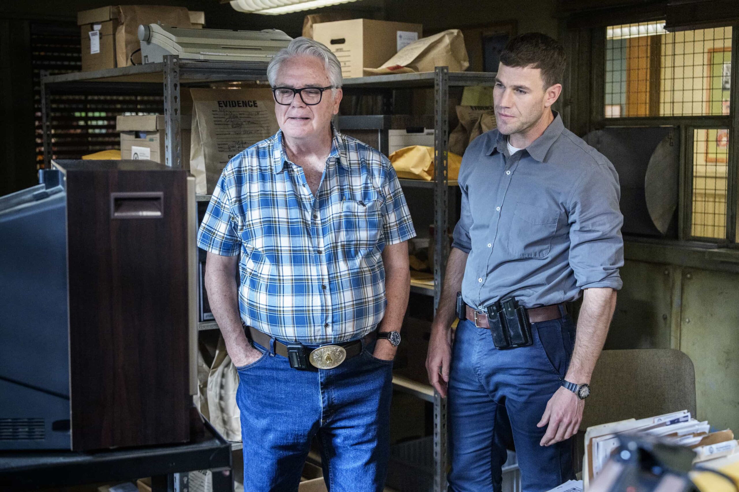 NCIS Origins Season 2 Episode 9 “Fools Rush In” – As the team discovers Gibbs’ drunken Vegas elopement with Diane, the newlyweds contemplate their future. Also, the team investigates a fatal movie theater bombing with a connection to the Pruitt compound where Franks’ brother Mason (guest star Philip Winchester) is staying, on NCIS: ORIGINS, Tuesday, March 3 (9:00-10:00 PM, ET/PT) on the CBS Television Network, and streaming on Paramount+. Pictured L to R: Michael J. Harney Kowalski and Austin Stowell as Leroy Jethro Gibbs.  Photo: Robert Voets/CBS ©2025 CBS Broadcasting, Inc. All Rights Reserved.