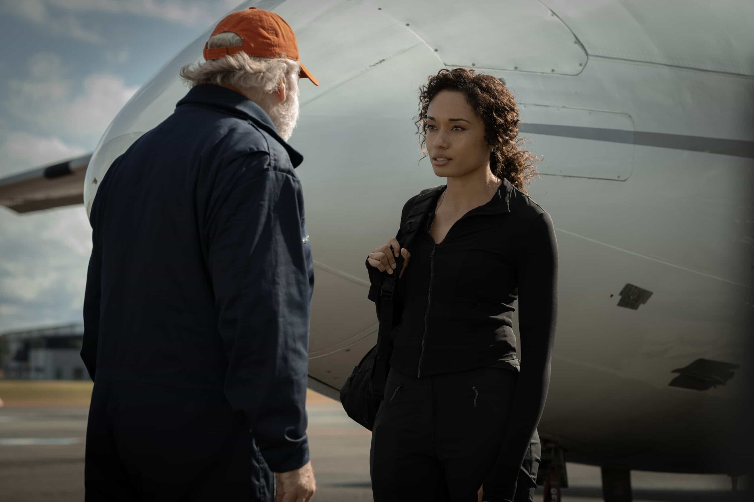 NCIS Sydney Season 3 Episode 9 Promo “South of Nowhere” – The team races to an Antarctica research base to investigate why a climate scientist killed a colleague on the eve of polar night – and make it out before their plane engine freezes and they’re trapped in darkness for six months, on NCIS: SYDNEY, Tuesday, March 3 (10:00-11:00 PM, ET/PT) on the CBS Television Network, and streaming on Paramount+. L-R: Mark Mitchinson as Scooter McCrae and Olivia Swann as NCIS Special Agent Captain Michelle Mackey in NCIS: Sydney episode 9, season 3 streaming on Paramount+, 2026. Photo Credit:  Daniel Asher Smith/Paramount+   © TM & © 2026 CBS Studios Inc. NCIS: Sydney and related marks and logos  are trademarks of CBS Studios Inc. All Rights Reserved.