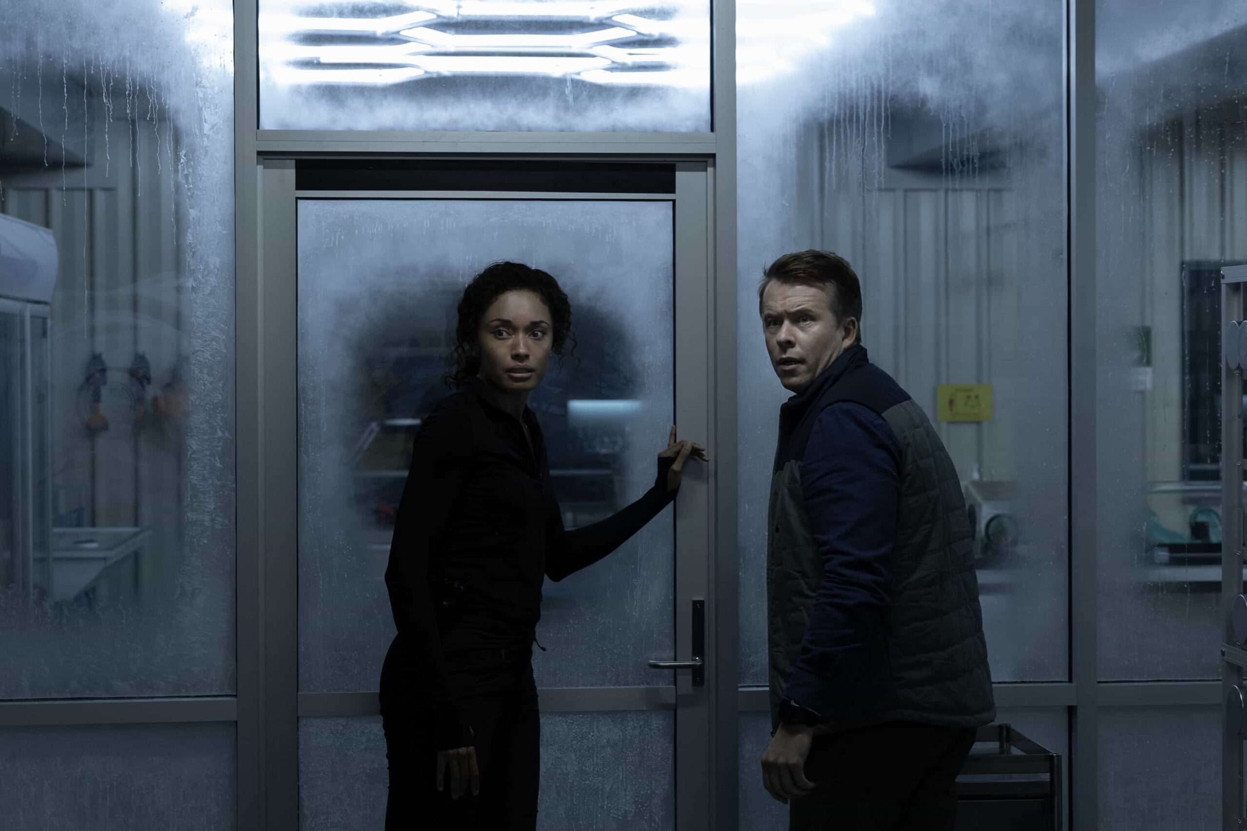 NCIS Sydney Season 3 Episode 9 Photo “South of Nowhere” – The team races to an Antarctica research base to investigate why a climate scientist killed a colleague on the eve of polar night – and make it out before their plane engine freezes and they’re trapped in darkness for six months, on NCIS: SYDNEY, Tuesday, March 3 (10:00-11:00 PM, ET/PT) on the CBS Television Network, and streaming on Paramount+. Olivia Swann as NCIS Special Agent Captain Michelle Mackey and Todd Lasance as AFP Liaison Officer Sergeant Jim \'JD\' Dempsey in NCIS: Sydney episode 9, season 3 streaming on Paramount+, 2026. Photo Credit:  Daniel Asher Smith/Paramount+   © TM & © 2026 CBS Studios Inc. NCIS: Sydney and related marks and logos  are trademarks of CBS Studios Inc. All Rights Reserved.