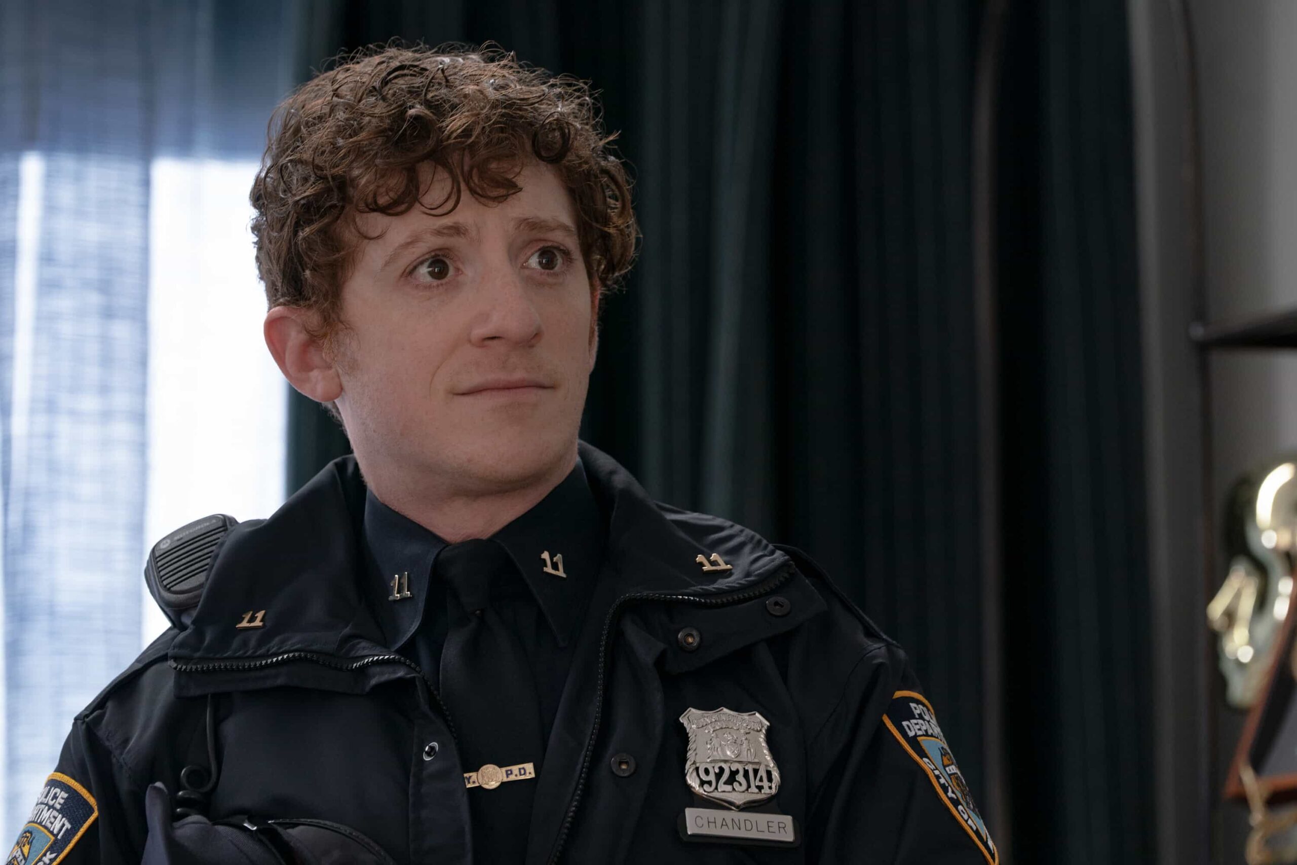 “All’s Hair” – When a celebrity wigmaker is murdered, Elsbeth must comb through a tangled mess of suspects – and some drag brunch mayhem – to clip a killer, on ELSBETH, Thursday, March 5 (10:00-11:00 PM, ET/PT) on the CBS Television Network, and streaming on Paramount+  Pictured: Ethan Slater as Officer Reese Chandler   Photo: Michael Parmelee/CBS ©2025 CBS Broadcasting, Inc. All Rights Reserved.