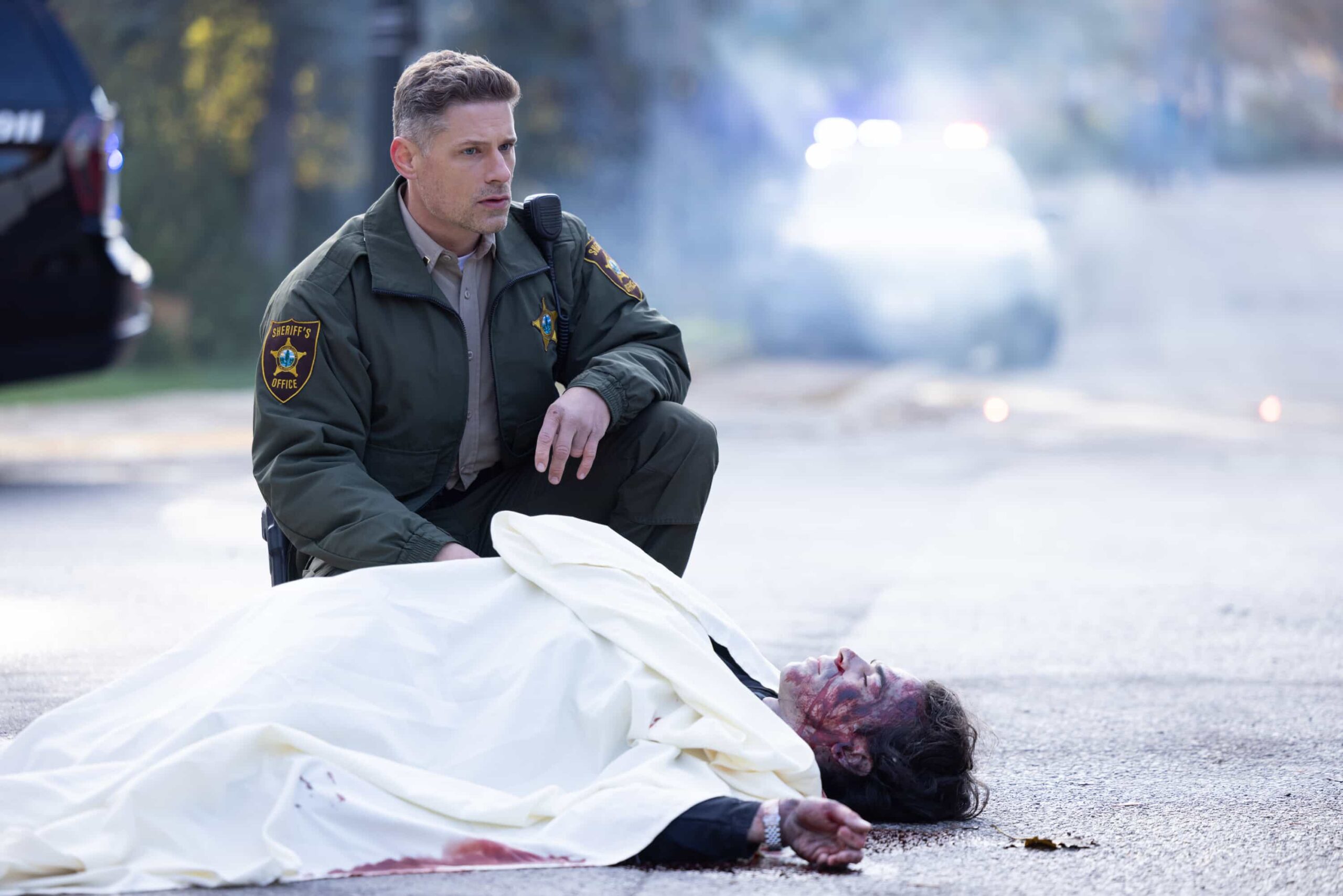 “The Aftermath” – When a courthouse security test ends in a shocking murder, Sheriff Mickey Fox uncovers a dangerous conspiracy reaching deep into Edgewater’s justice system.Pictured: Matt Lauria as Boone and Hunter Cardinal as Theo. Photo: Darren Goldstein/CBS ©2025 CBS Broadcasting, Inc. All Rights Reserved.