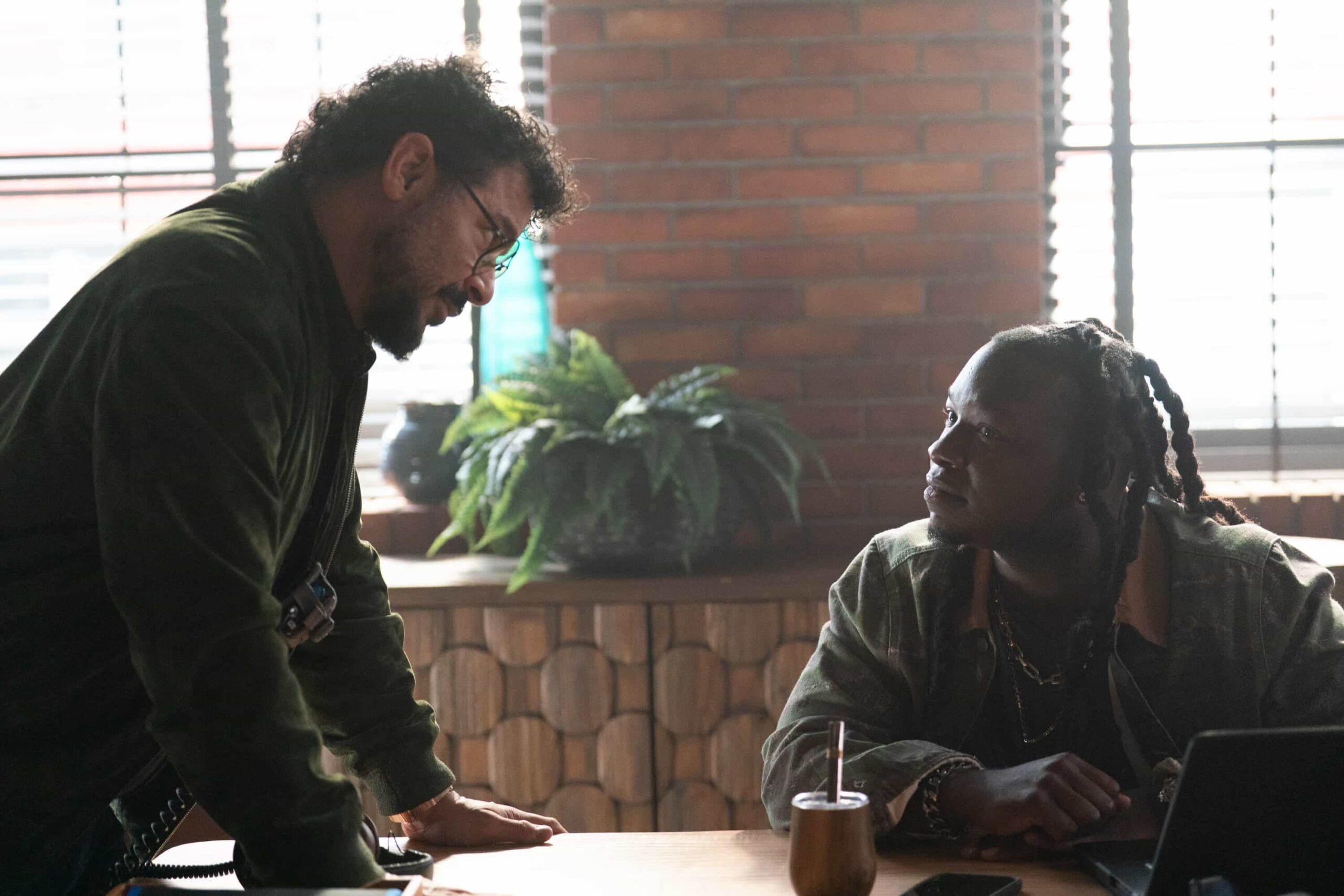 BTS “To the Bone” – When an 18-year-old goes missing from his family’s restaurant, Colter uncovers the teen’s underground fake ID business and the secret life he’s been hiding from his parents.Pictured: Director Jon Huertas and Chris Lee. Photo: Darko Sikman/CBS ©2025 CBS Broadcasting, Inc. All Rights Reserved.