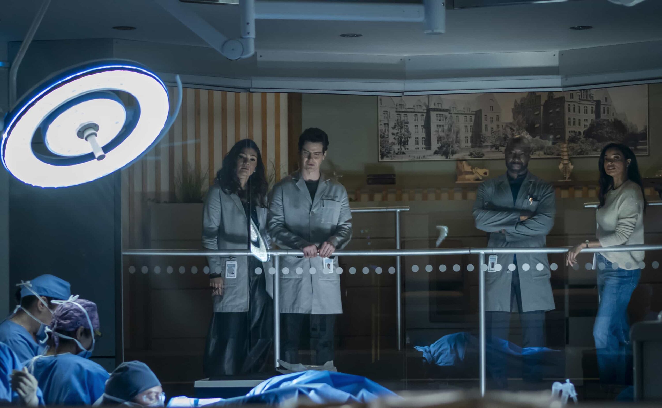 Watson Season 2 Episode 12 “A Family Meal” - When a patient arrives at the Holmes Clinic plagued by a mysterious neurological disorder, Watson and the fellows discover they were forced to eat their parents amid a childhood survival incident. Meanwhile, Adam is struggling with how his future will change as a father, on WATSON, Sunday, March 1 (10:00-11:00 PM, ET/PT) on the CBS Television Network, and streaming on Paramount+  Pictured (L-R): Inga Schlingmann as Dr. Sasha Lubbock, Peter Mark Kendall as Dr. Stephens Croft, Morris Chestnut as Dr. John Watson, and Rochelle Aytes as Dr. Mary Morstan  Photo: Colin Bentley/CBS ©2025 CBS Broadcasting, Inc. All Rights Reserved.