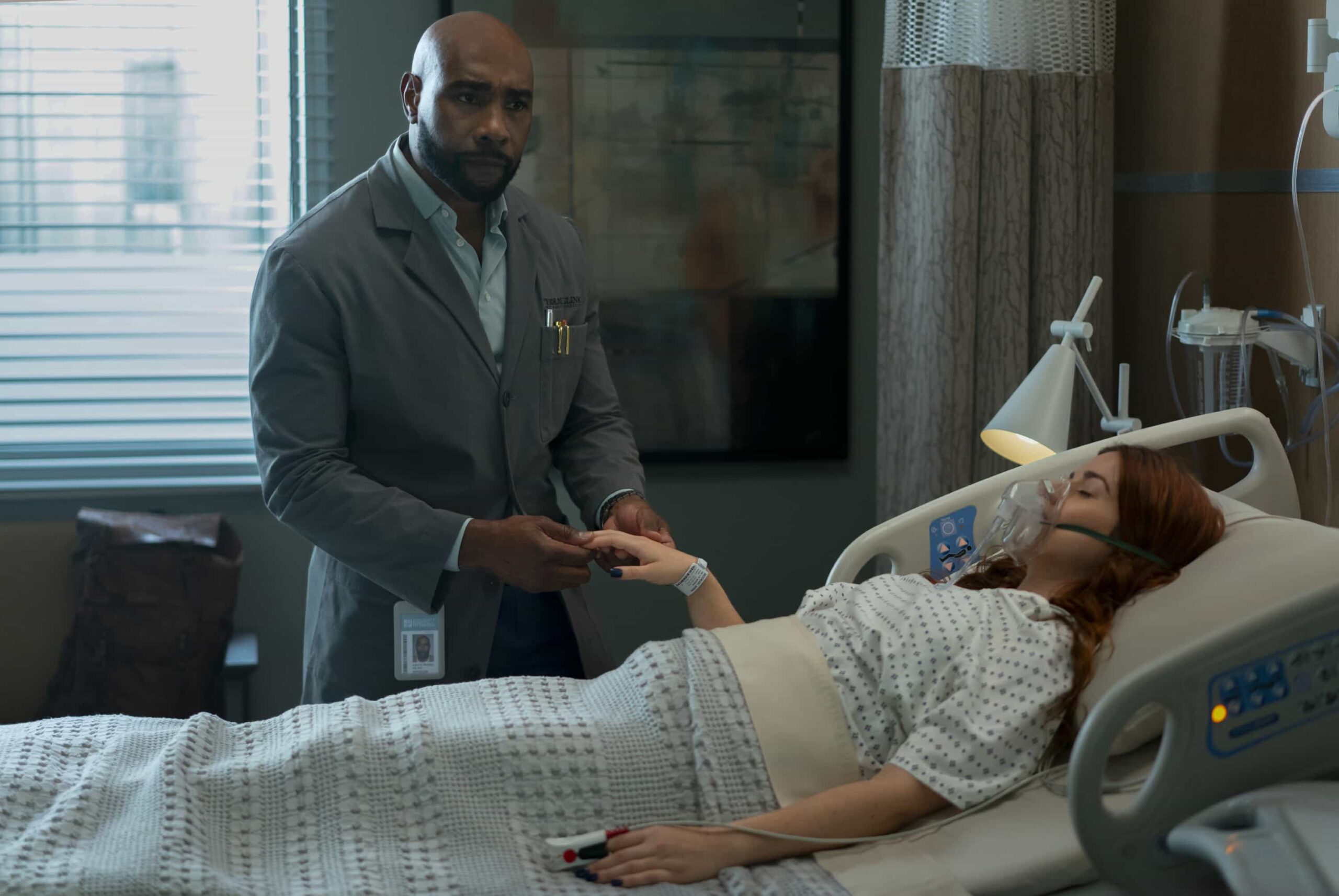 Watson Season 2 Episode 12 Picture “A Family Meal” - When a patient arrives at the Holmes Clinic plagued by a mysterious neurological disorder, Watson and the fellows discover they were forced to eat their parents amid a childhood survival incident. Meanwhile, Adam is struggling with how his future will change as a father, on WATSON, Sunday, March 1 (10:00-11:00 PM, ET/PT) on the CBS Television Network, and streaming on Paramount+  Pictured (L-R): Morris Chestnut as Dr. John Watson and Dani Alvarado as Wren Booker   Photo: Colin Bentley/CBS ©2025 CBS Broadcasting, Inc. All Rights Reserved.