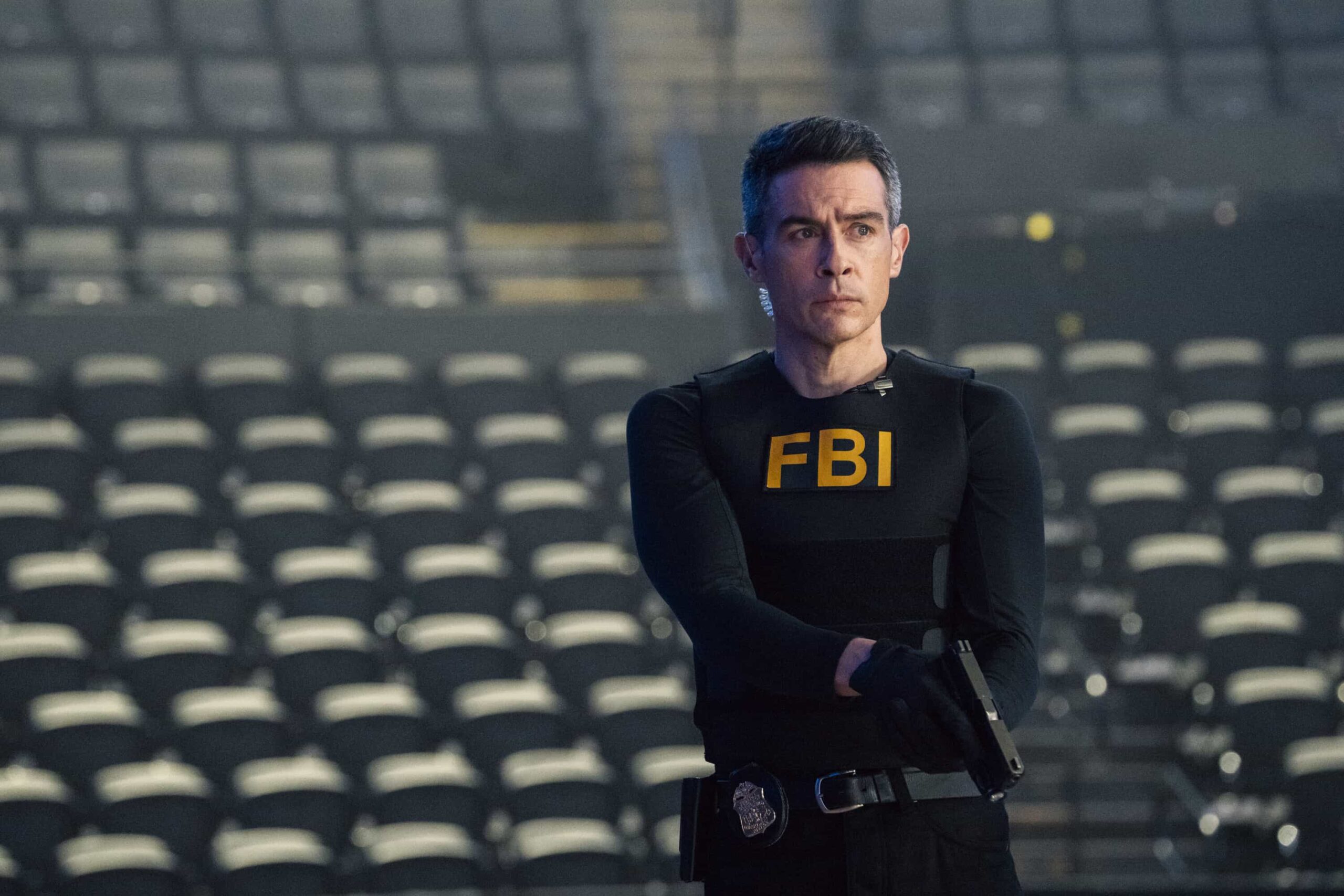 FBI Season 8 Episode 13 Still “Fanatics” – After the son of a professional basketball team owner is taken for ransom, Jubal and the team race to catch the kidnappers. Soon, they discover the perpetrators have been planning a larger revenge plot that they must act quickly to stop, on FBI, Monday, March 9 (9:00-10:00 PM, ET/PT). Pictured: John Boyd as Special Agent Stuart Scola. Photo: Bennett Raglin/CBS ©2026 CBS Broadcasting, Inc. All Rights Reserved.